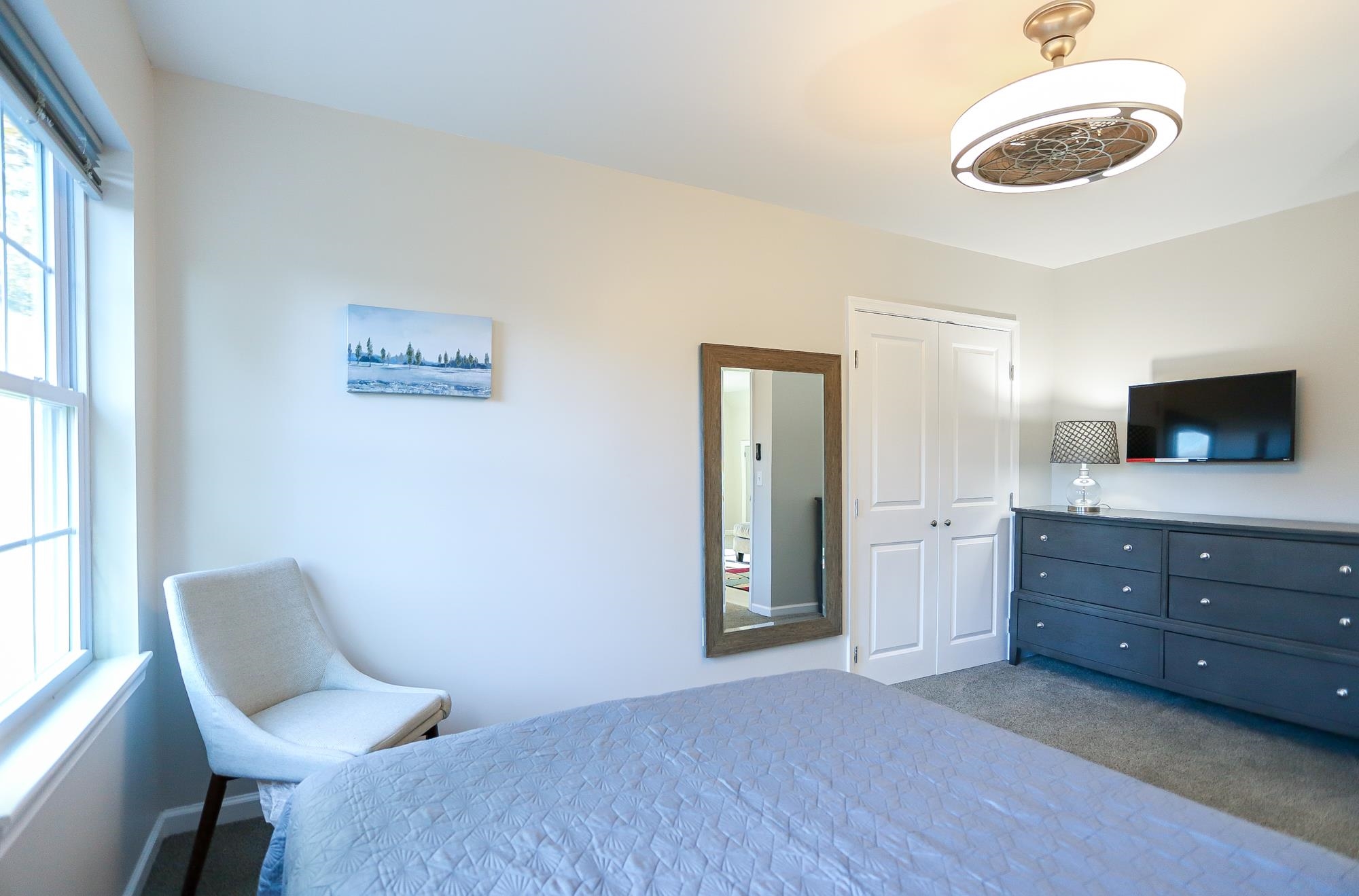 18 Cedarbrook Road Cape May, NJ 08204 - Photo 25 of 44 a bedroom with a bed and a television