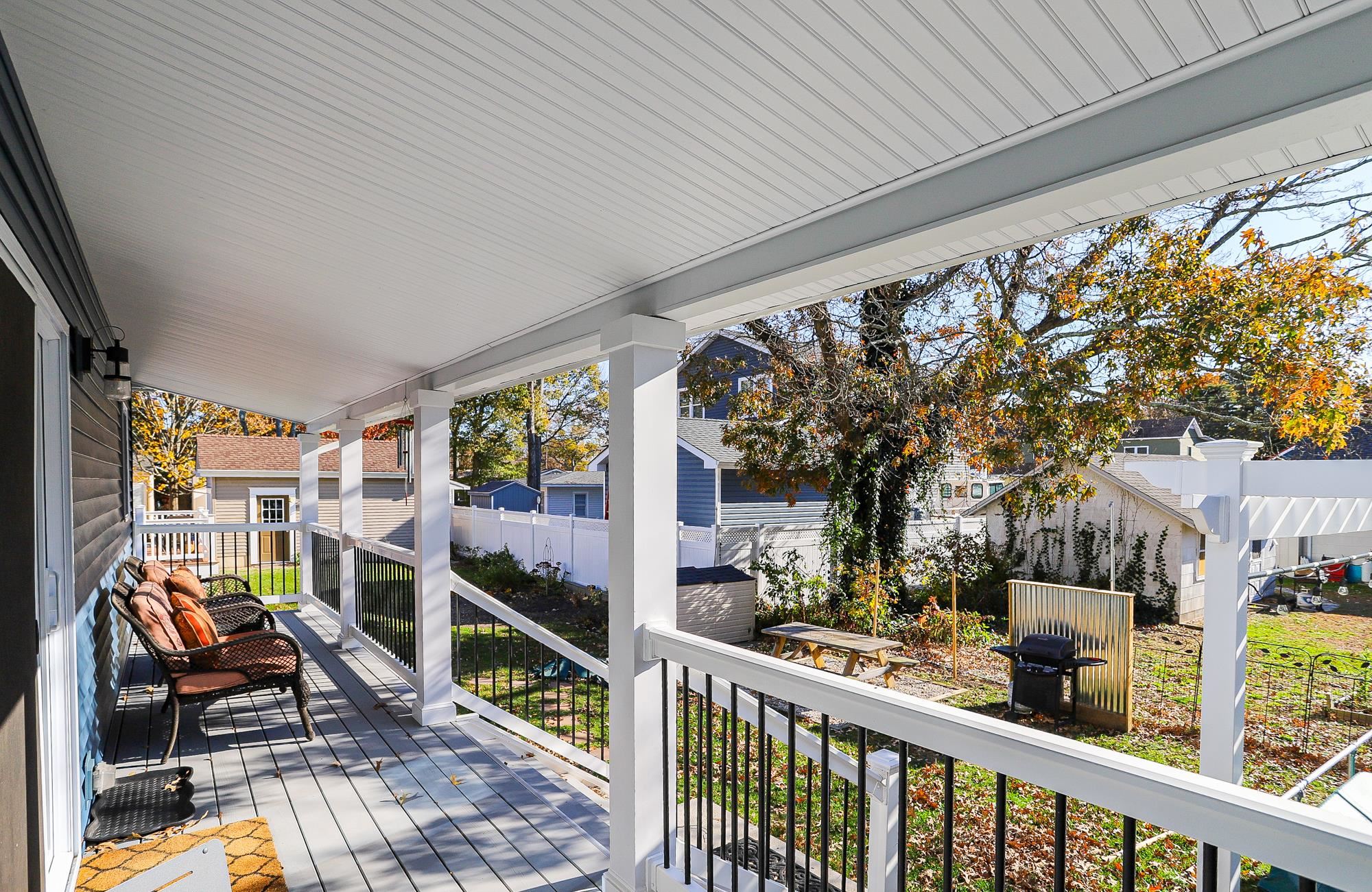 18 Cedarbrook Road Cape May, NJ 08204 - Photo 31 of 44 a view of a porch with furniture