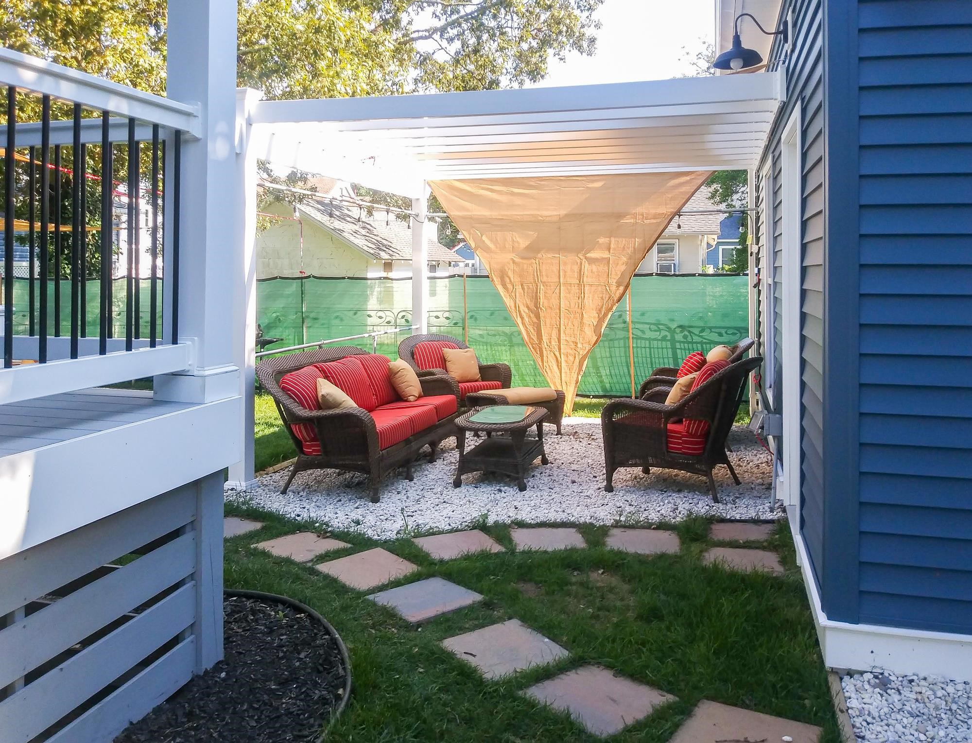 18 Cedarbrook Road Cape May, NJ 08204 - Photo 32 of 44 a backyard of a house with seating space