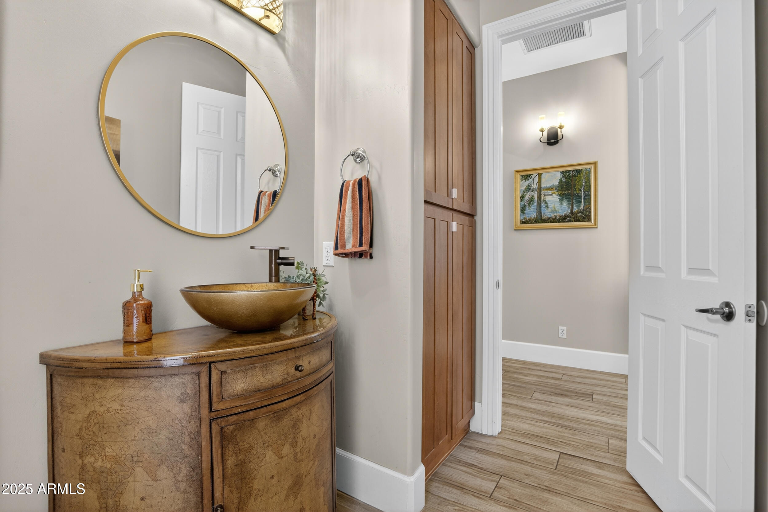 1333 North Cliffside Drive Gilbert, AZ 85234 - Photo 17 of 100 a bathroom with a toilet and a mirror
