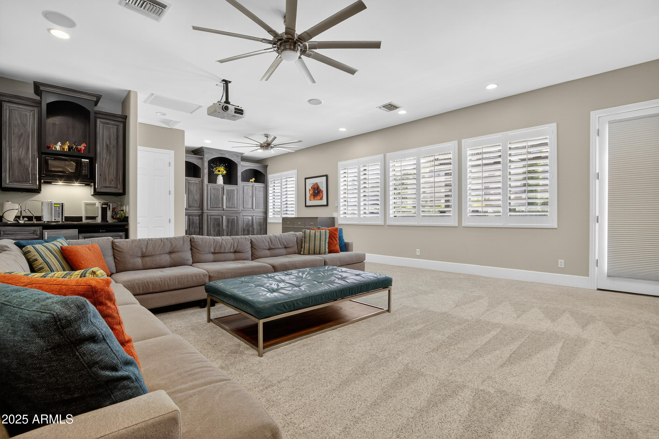 1333 North Cliffside Drive Gilbert, AZ 85234 - Photo 34 of 100 a living room with furniture and a large window