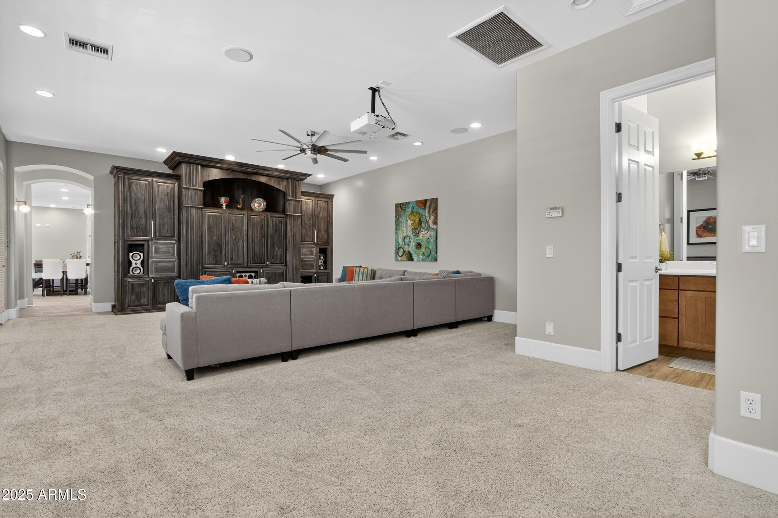 1333 North Cliffside Drive Gilbert, AZ 85234 - Photo 38 of 100 a living room with furniture and a flat screen tv