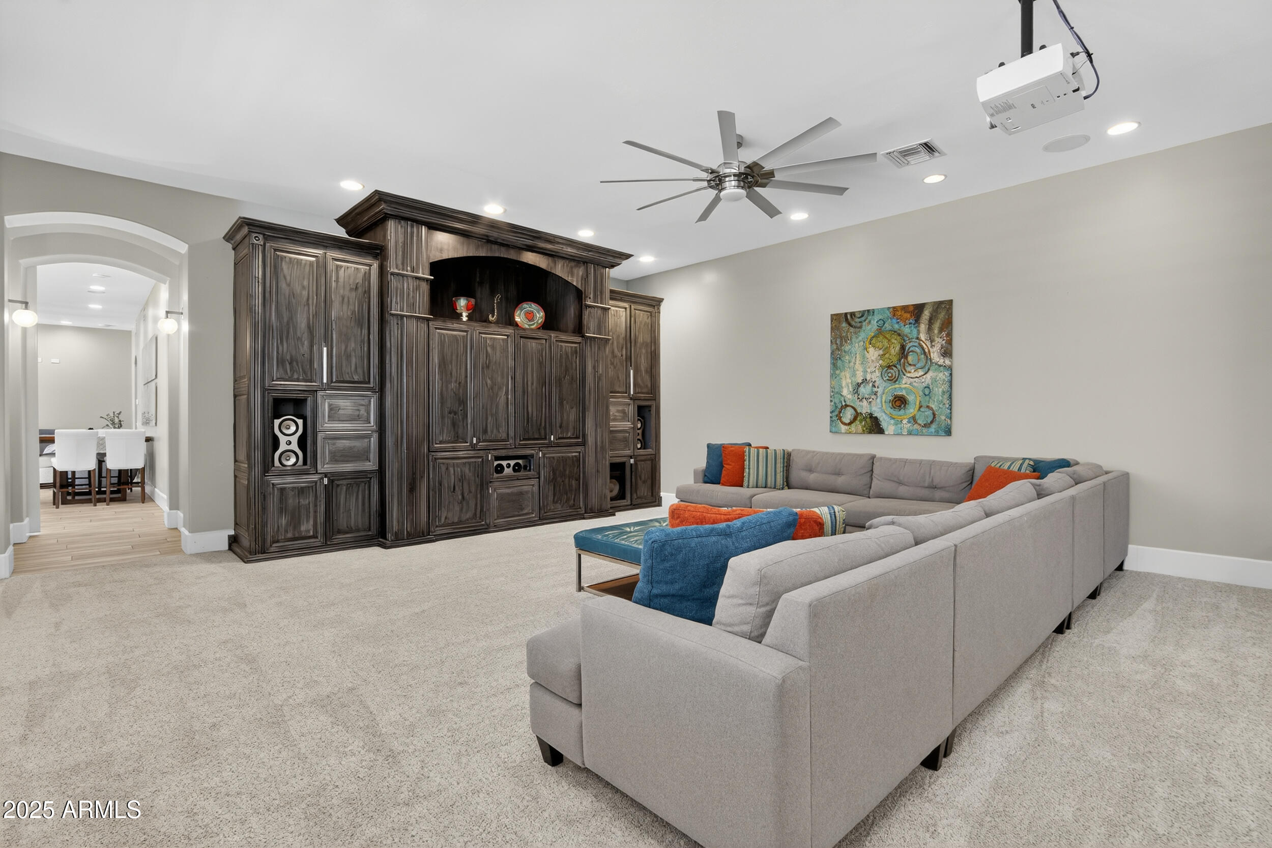1333 North Cliffside Drive Gilbert, AZ 85234 - Photo 39 of 100 a living room with furniture and a chandelier