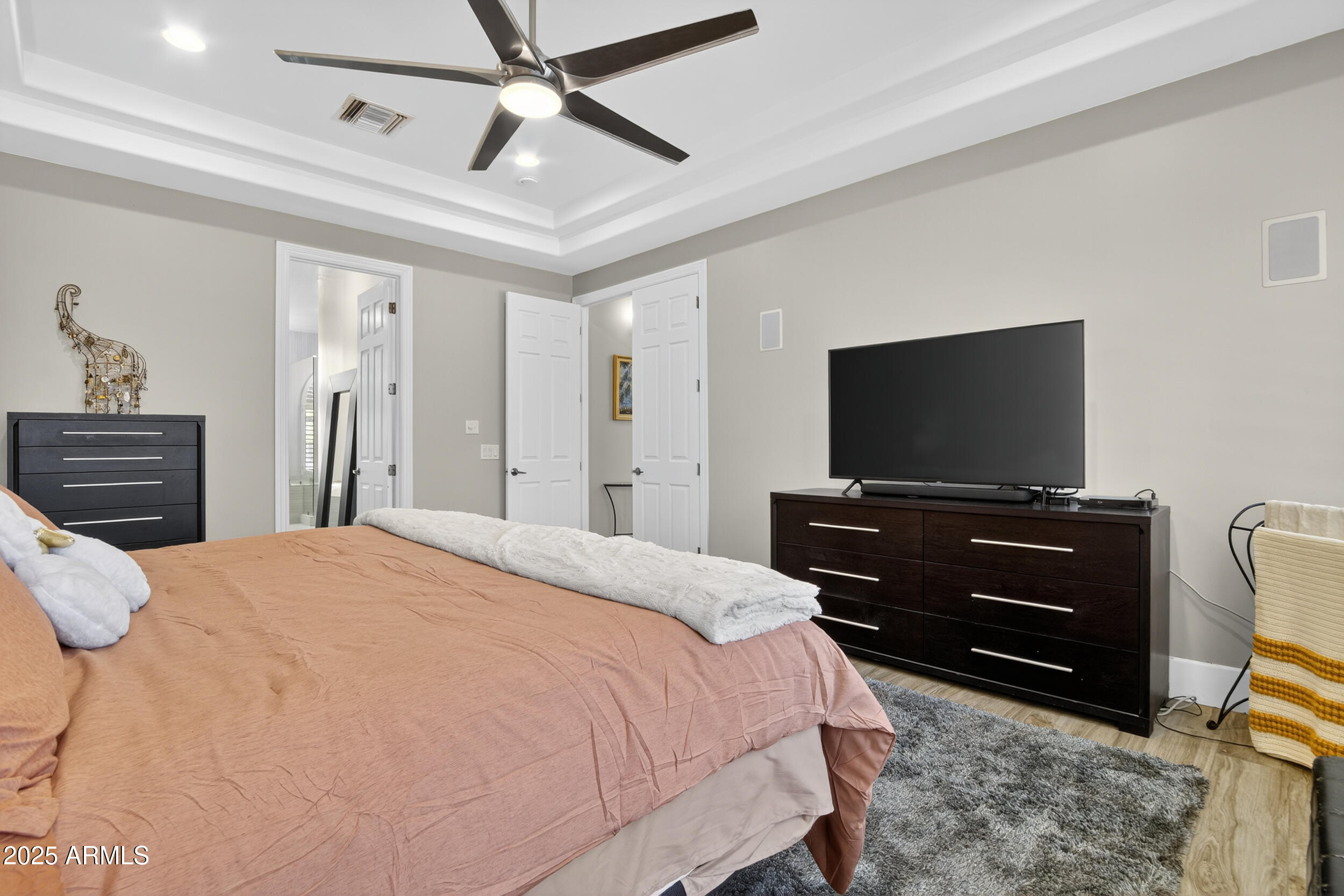 1333 North Cliffside Drive Gilbert, AZ 85234 - Photo 41 of 100 a bedroom with a bed and a flat screen tv