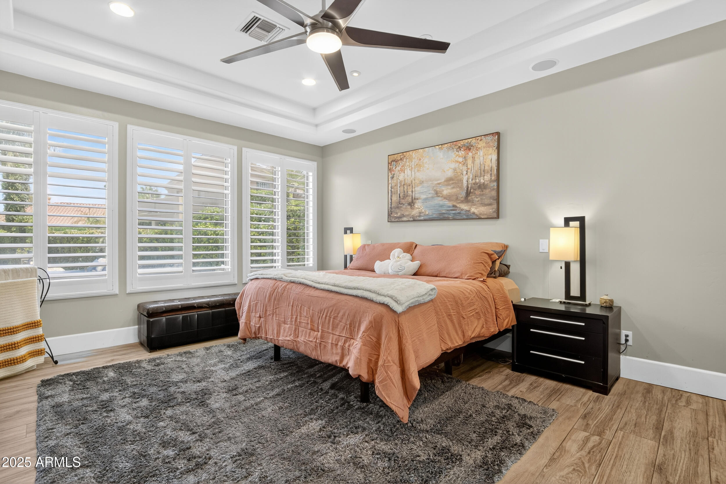 1333 North Cliffside Drive Gilbert, AZ 85234 - Photo 42 of 100 a spacious bedroom with a bed and a chandelier