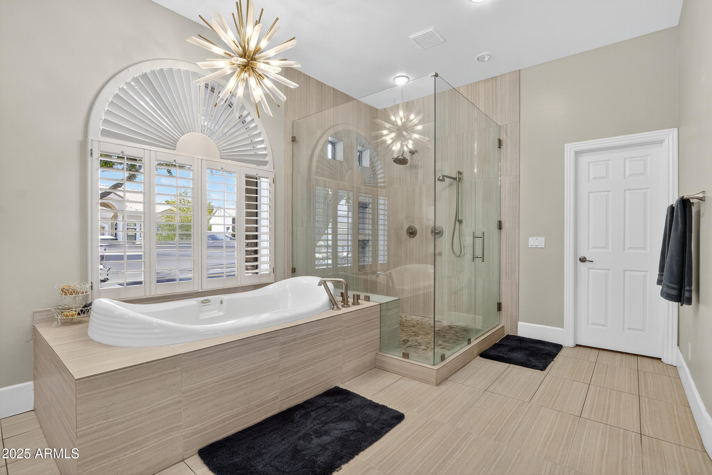 1333 North Cliffside Drive Gilbert, AZ 85234 - Photo 45 of 100 a spacious bathroom with a sink a mirror a bathtub and shower