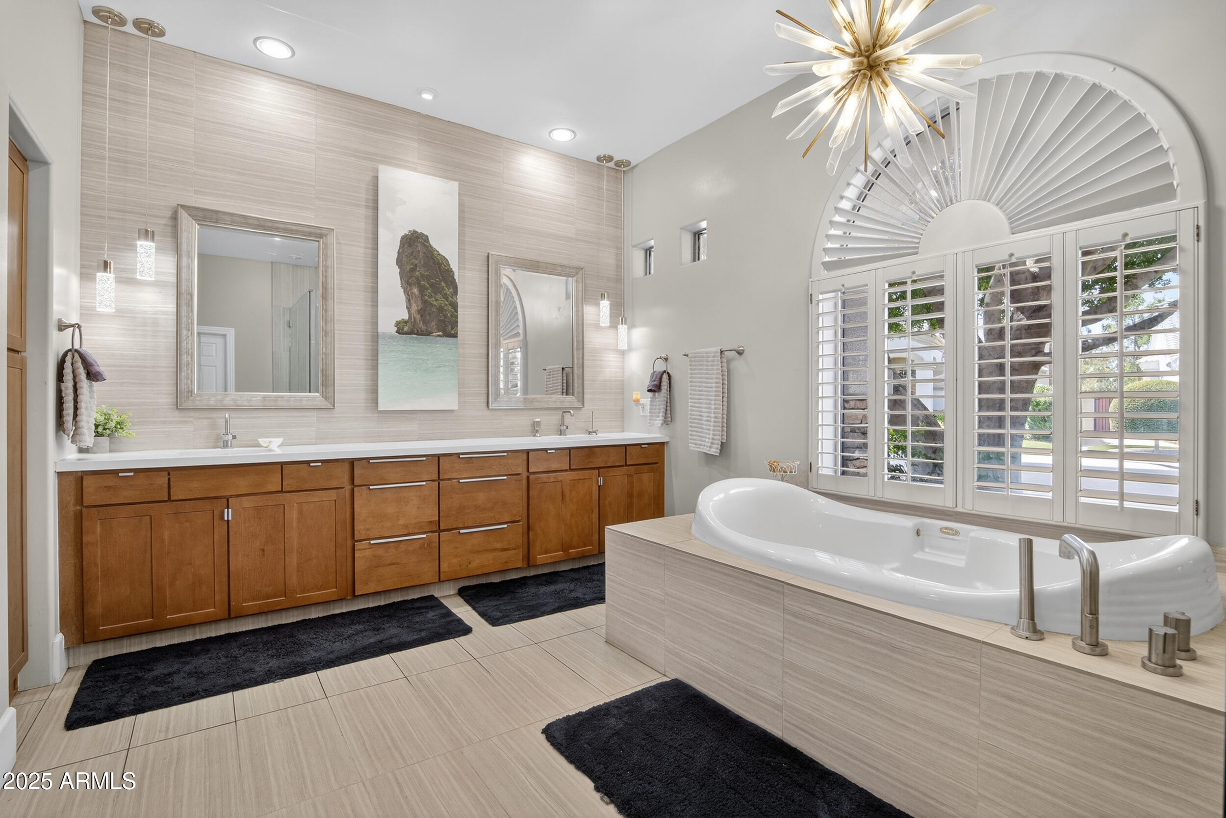 1333 North Cliffside Drive Gilbert, AZ 85234 - Photo 48 of 100 a spacious bathroom with a double vanity sink a mirror and a bathtub