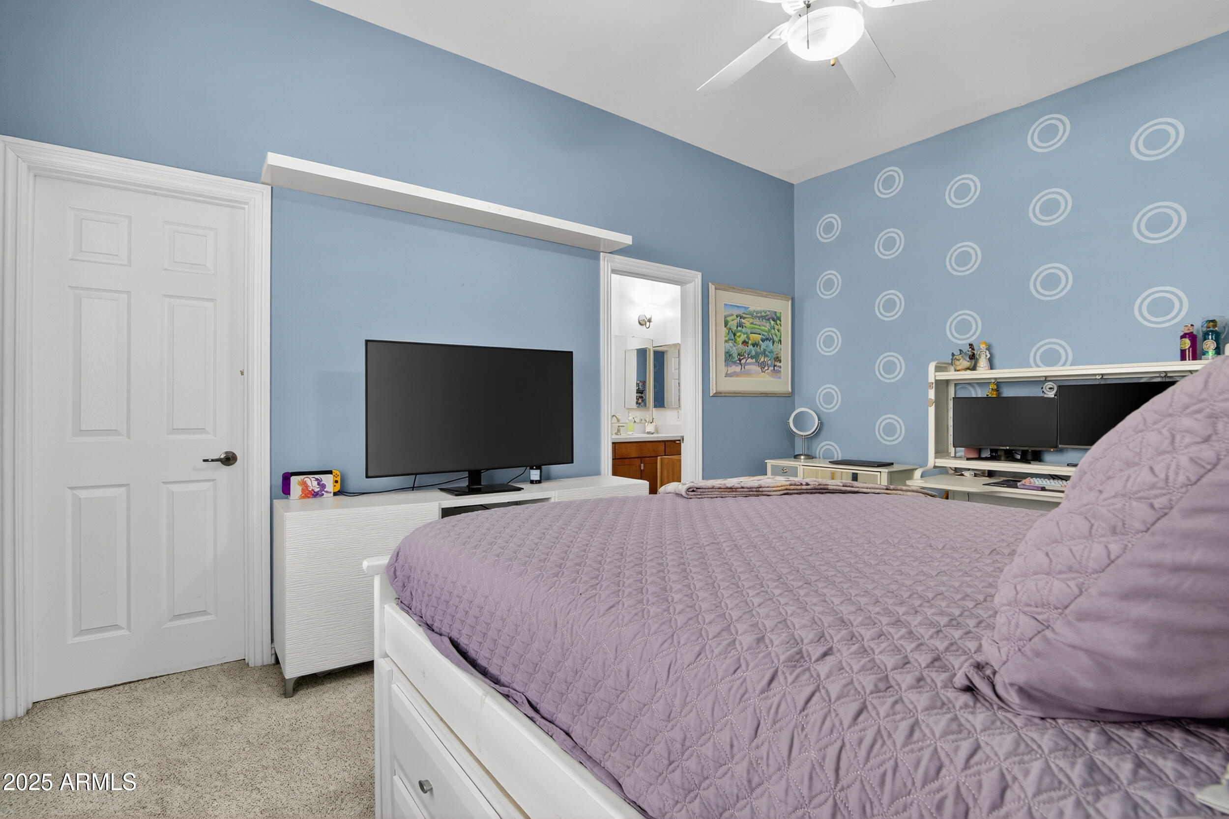 1333 North Cliffside Drive Gilbert, AZ 85234 - Photo 52 of 100 a bedroom with bed and a flat tv screen on dresser