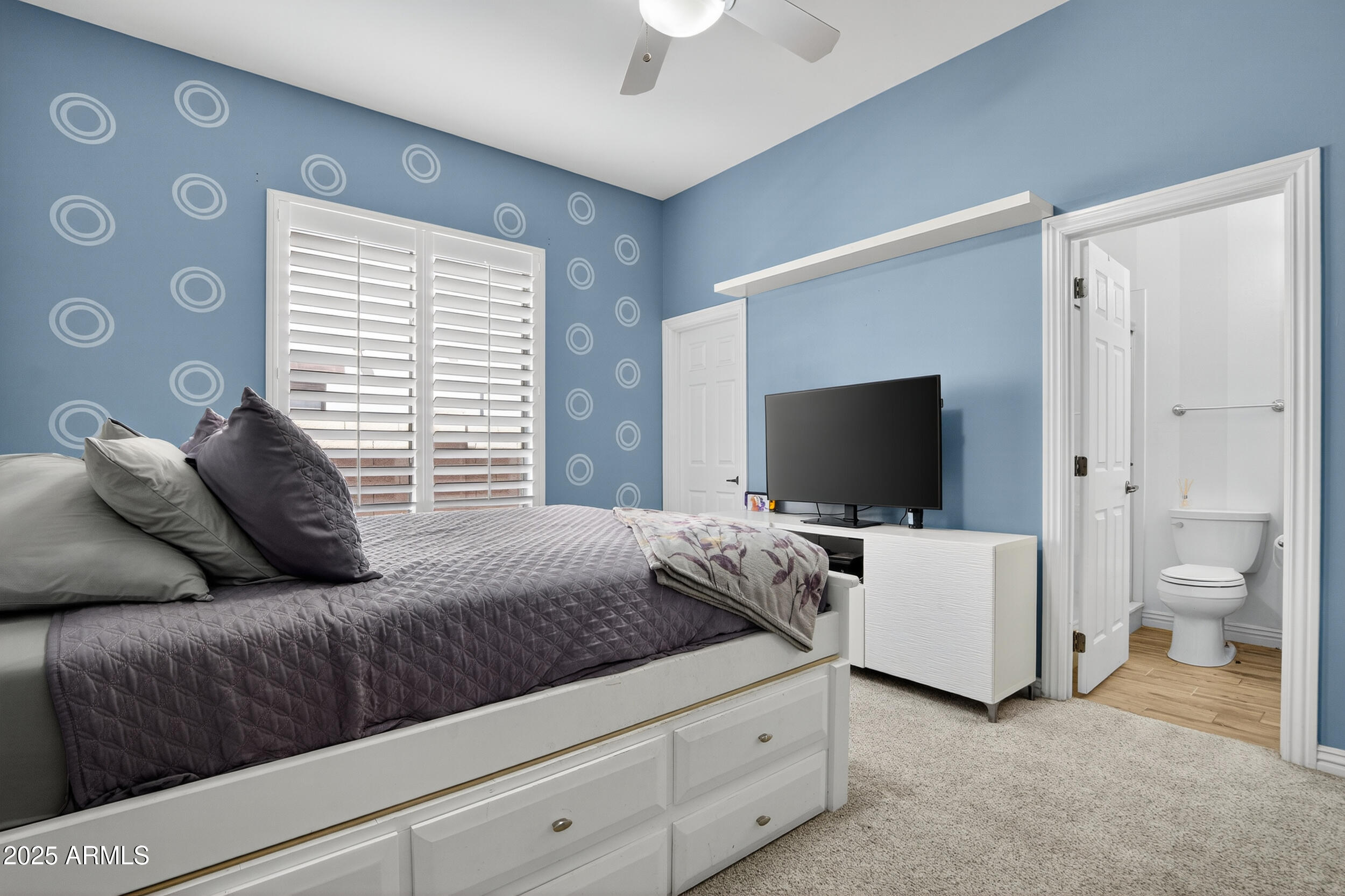 1333 North Cliffside Drive Gilbert, AZ 85234 - Photo 53 of 100 a bedroom with a bed and a flat screen tv