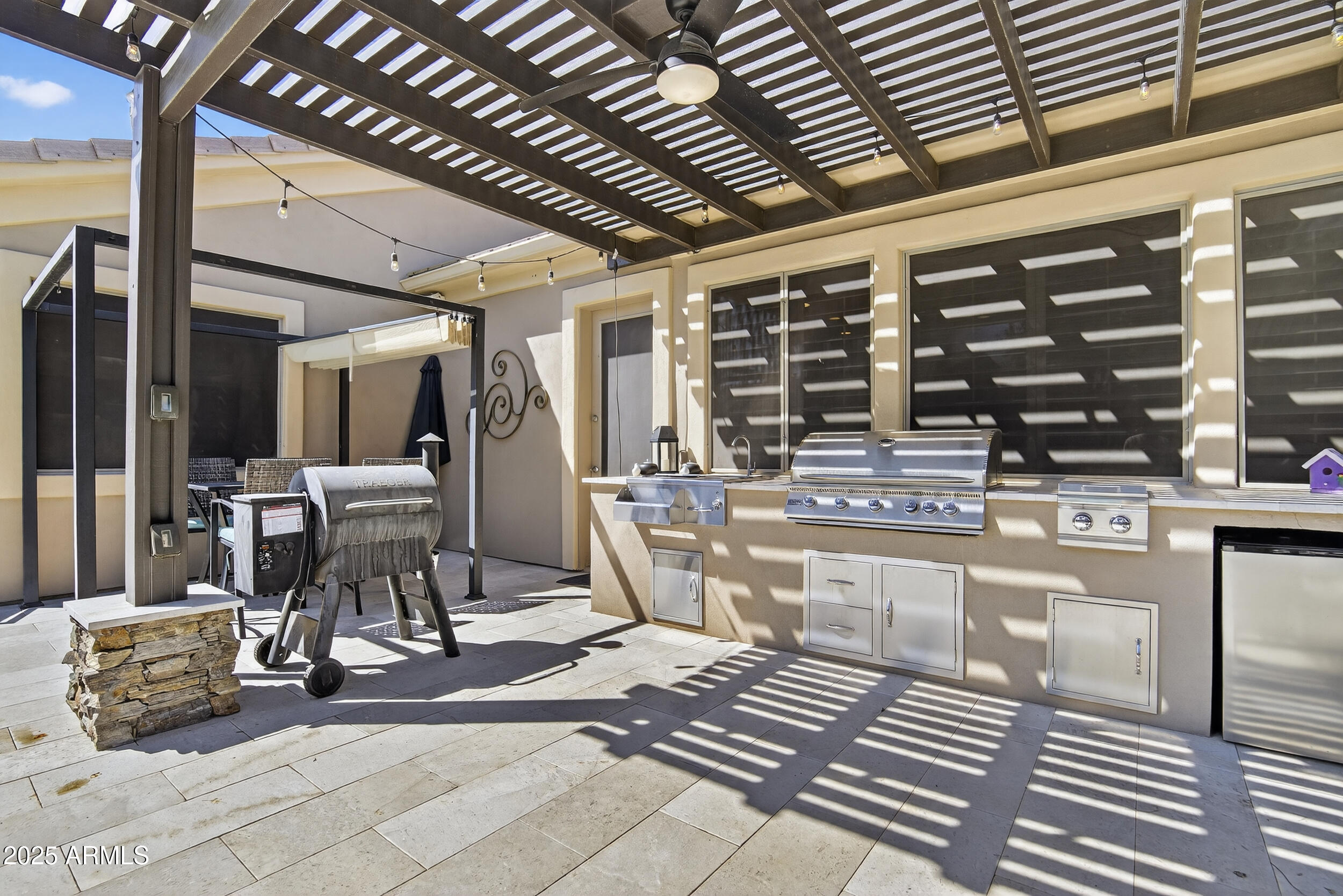 1333 North Cliffside Drive Gilbert, AZ 85234 - Photo 64 of 100 a view of a chairs and table in the patio