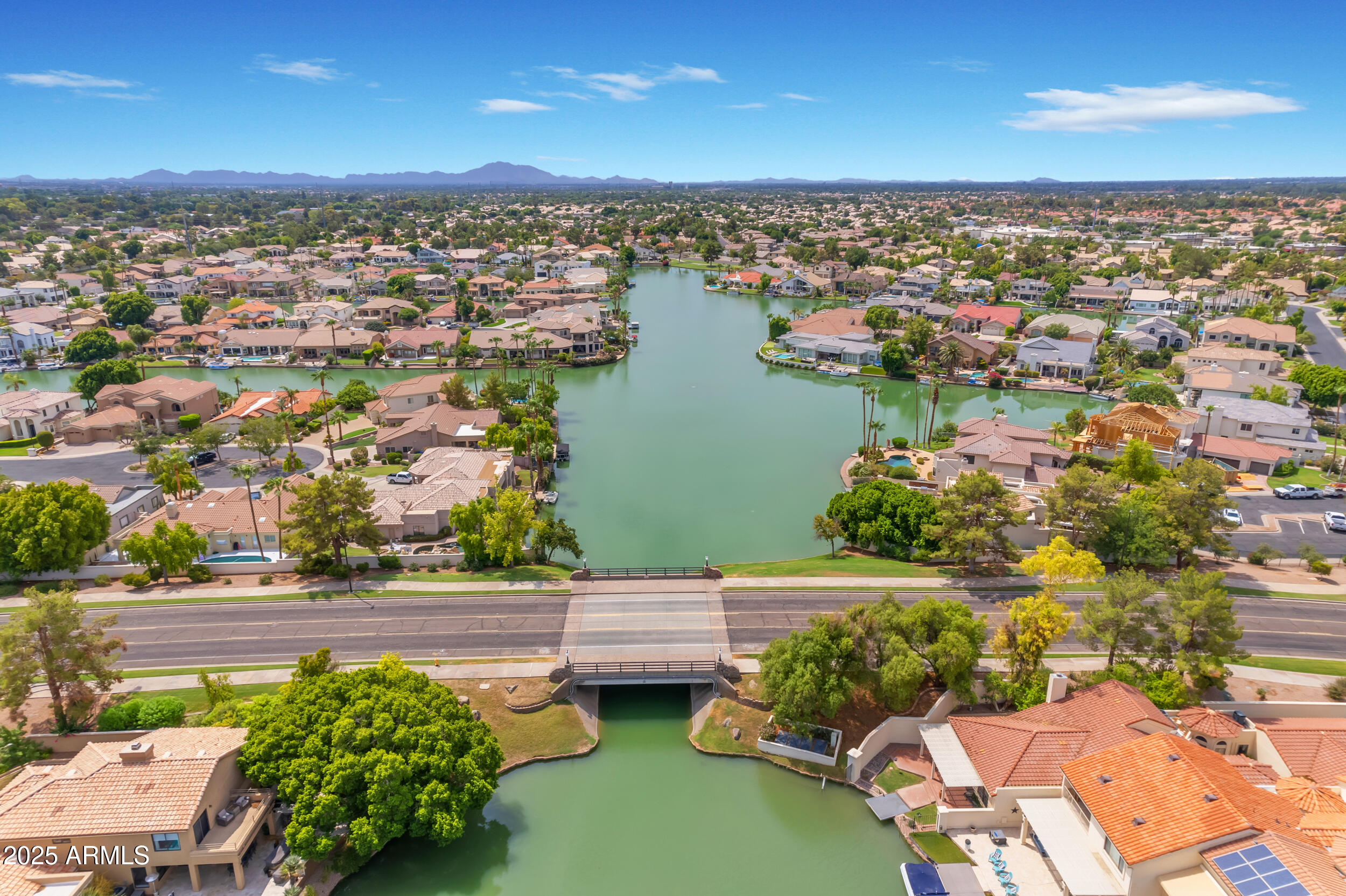 1333 North Cliffside Drive Gilbert, AZ 85234 - Photo 98 of 100 an aerial view of a house with a yard lake view and mountain view