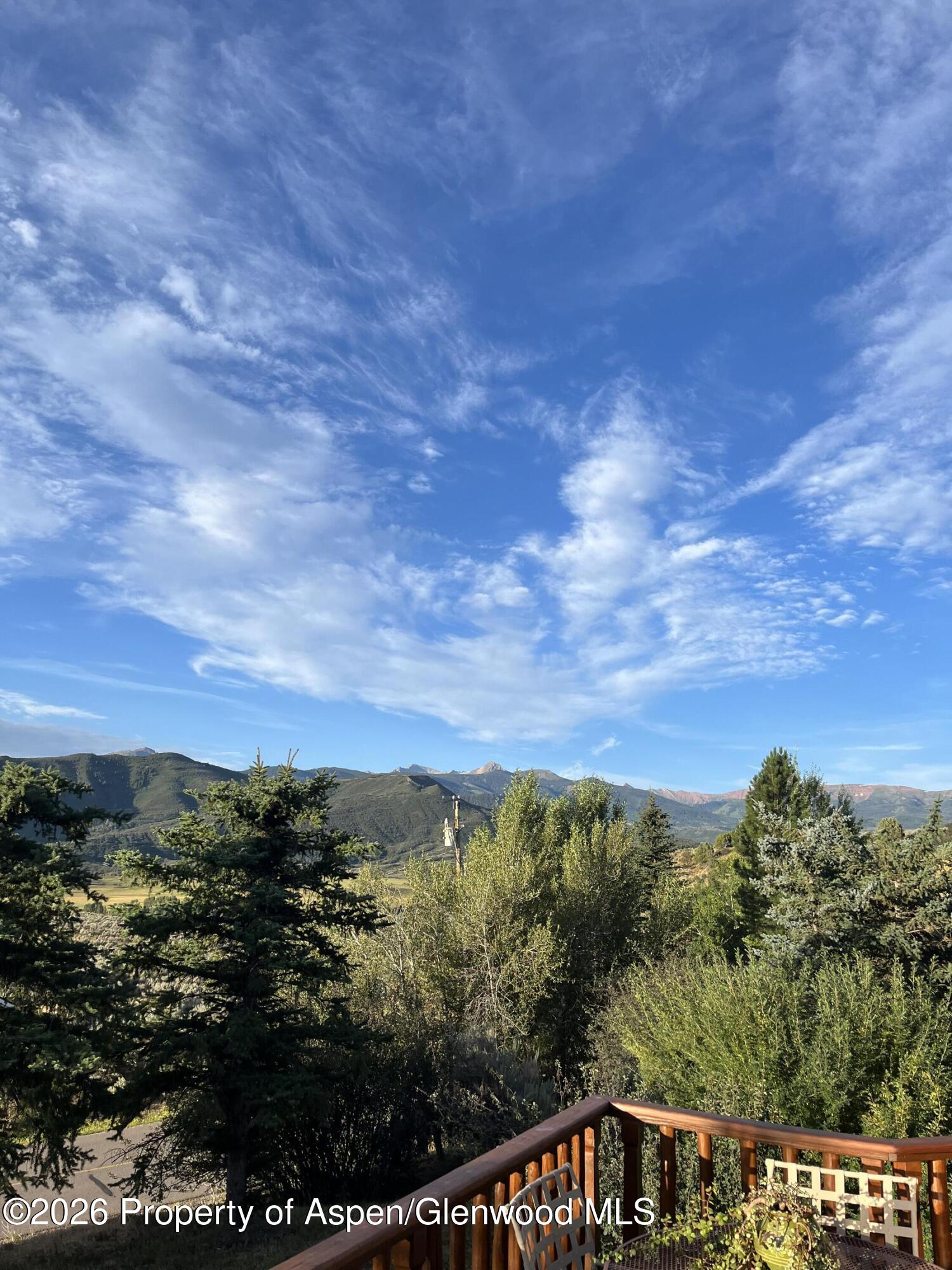 234 Light Hill Road Snowmass, CO 81654 - Photo 9 of 29 234 Deck Capital Clouds
