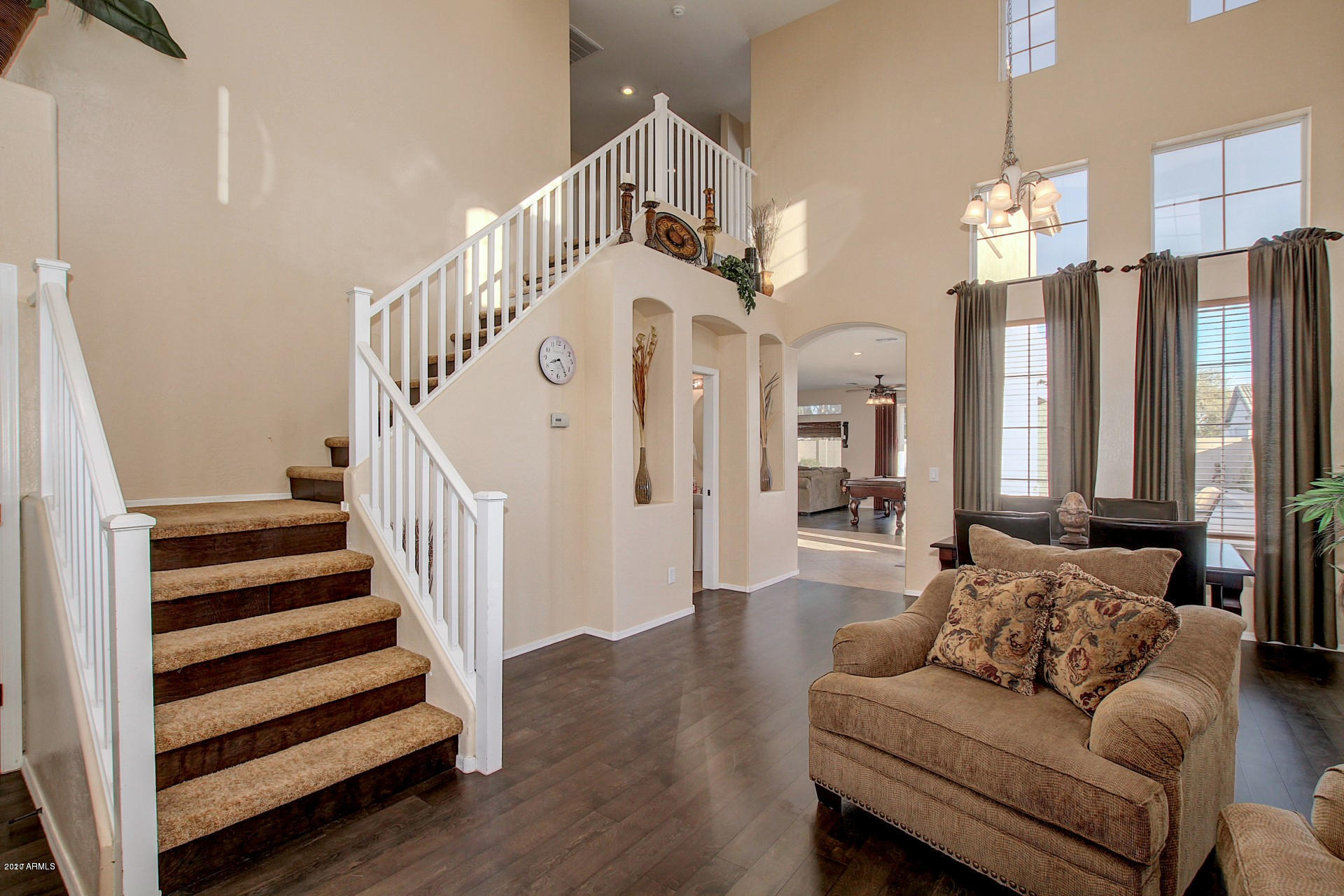 2010 West Carson Road Phoenix, AZ 85041 - Photo 6 of 12 a living room with furniture and wooden floor