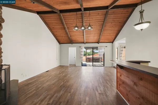 a view of entryway with wooden floors