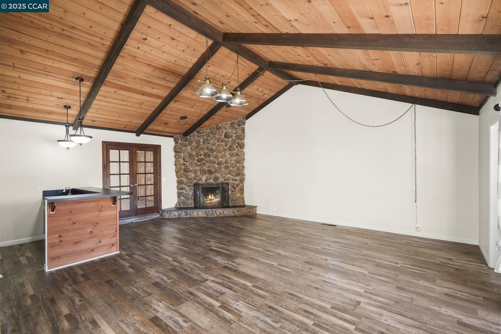 1610 Lawrence Road Danville, CA 94506 - Photo 18 of 36 a view of an empty room with wooden floor and a window