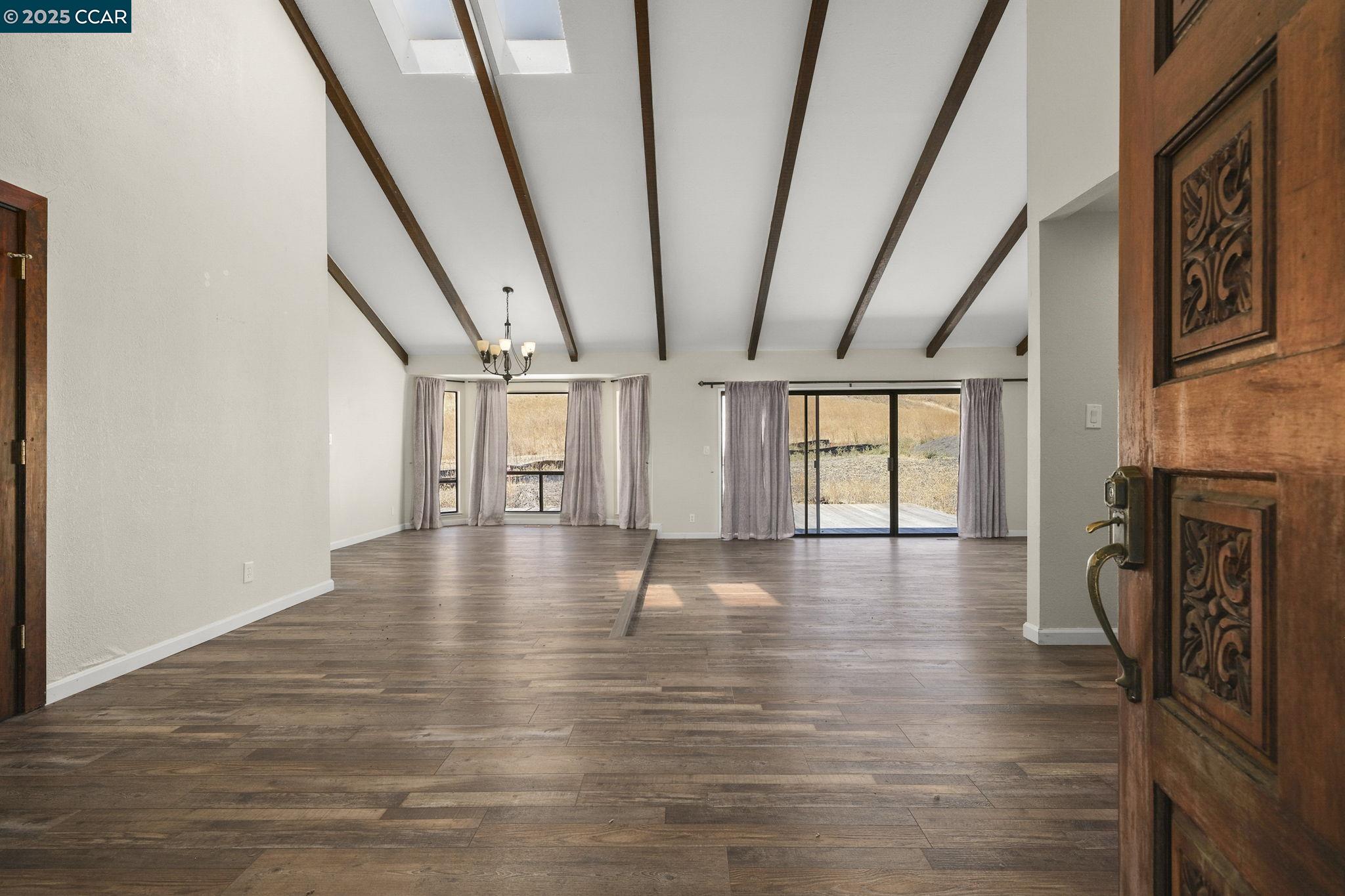 1610 Lawrence Road Danville, CA 94506 - Photo 9 of 36 a view of empty room with wooden floor and fan