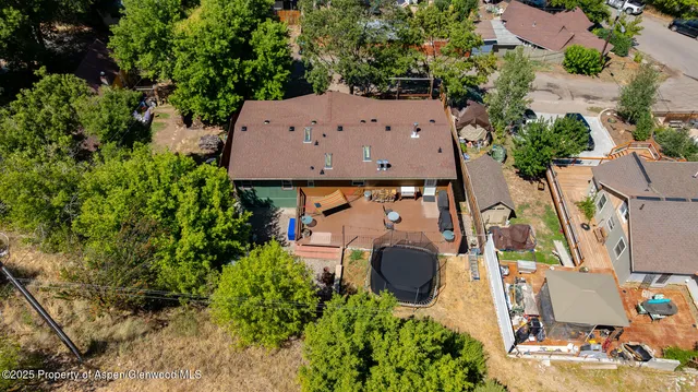 a view of a city with a lake