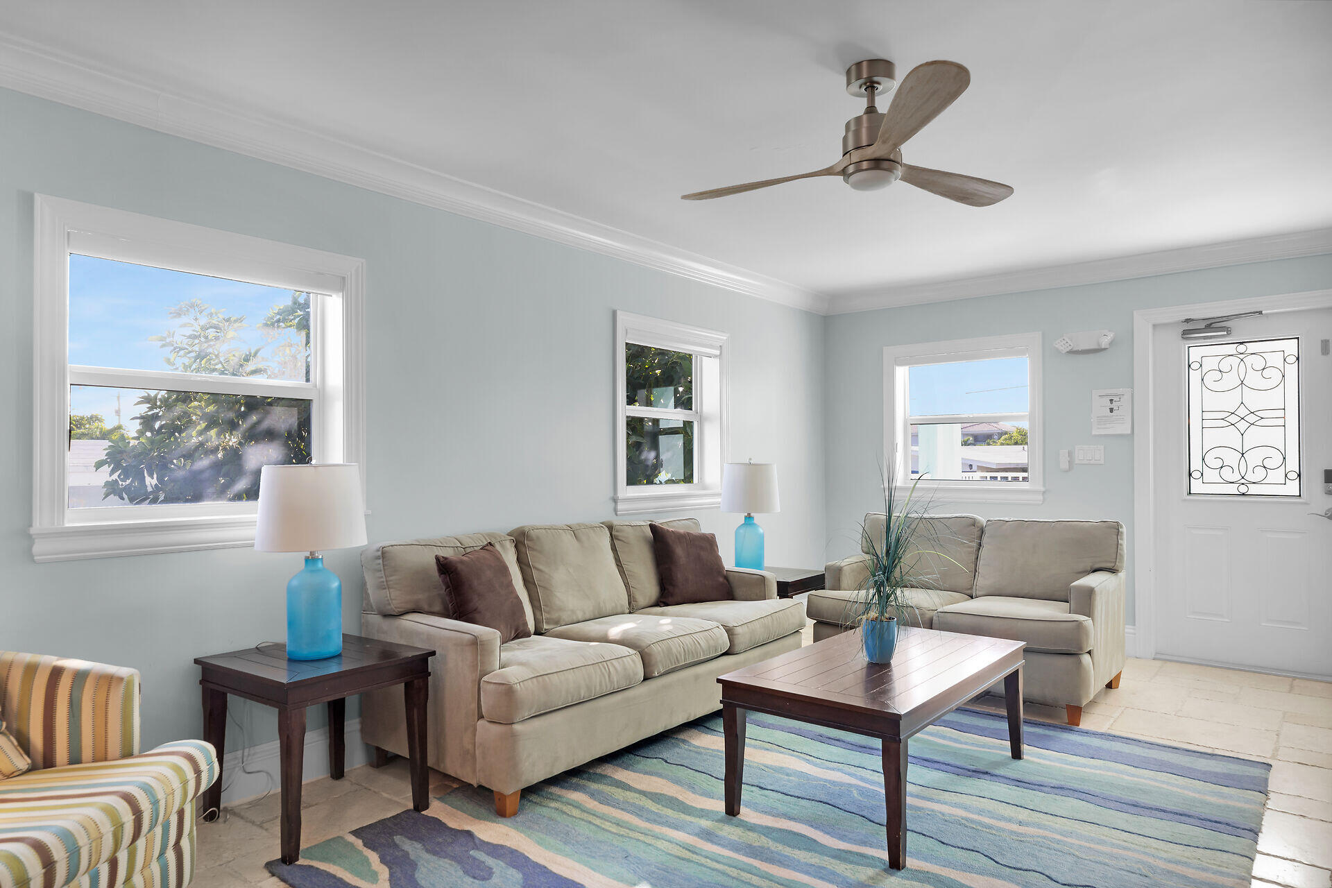 580-590 10th Street Key Colony Beach, FL 33051 - Photo 50 of 75 a living room with furniture and a window