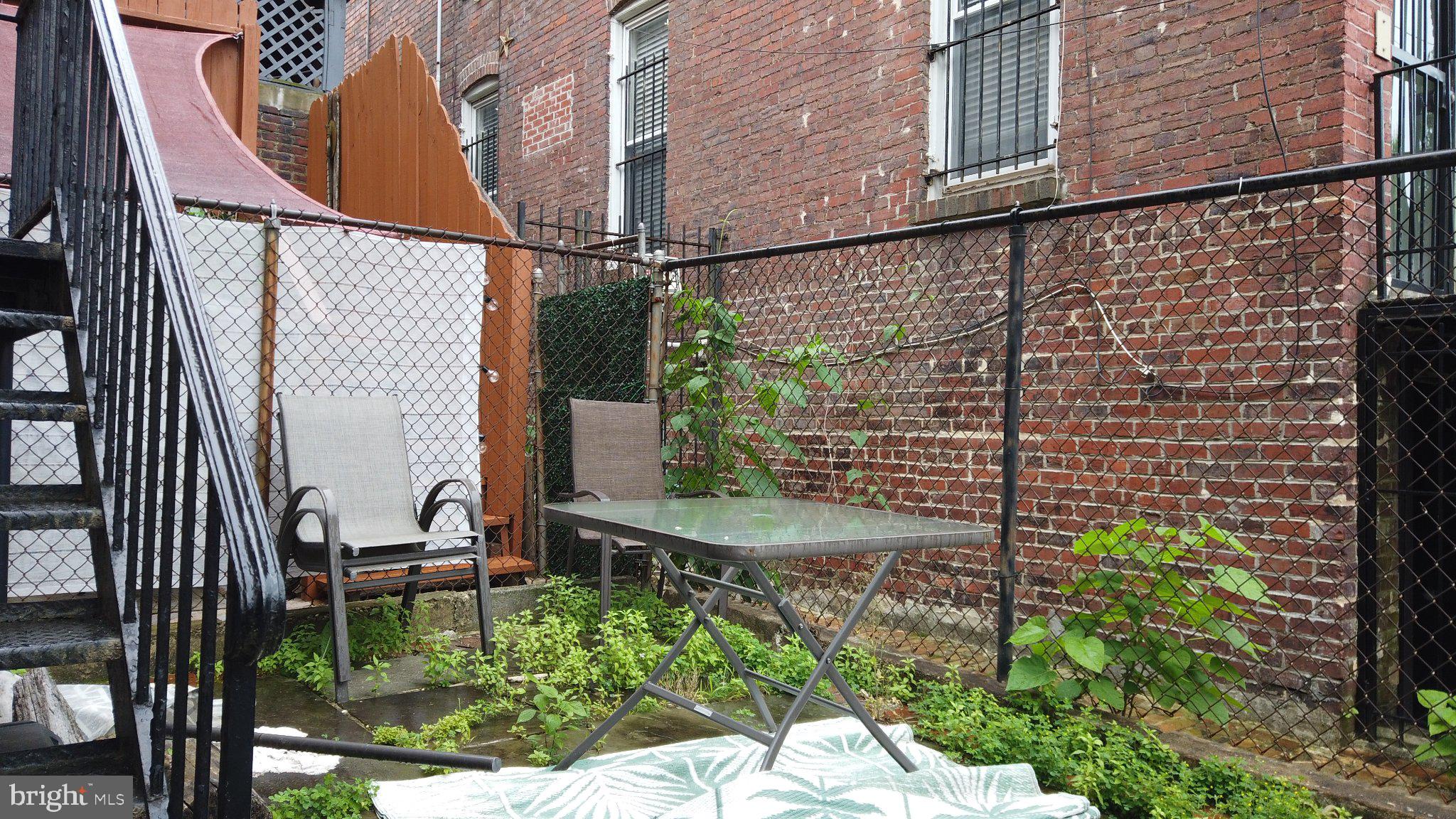 604 9th Street Northeast Washington, DC 20002 - Photo 8 of 28 Urban oasis with rustic charm.