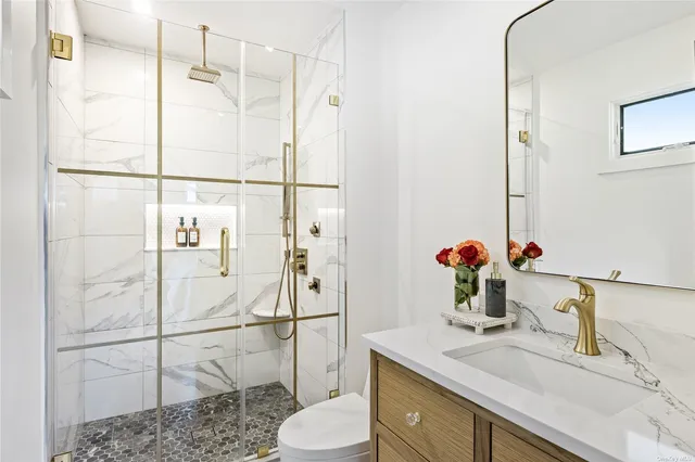 a bedroom with a bed and a table