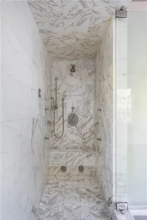 a view of a terrace with a barbeque