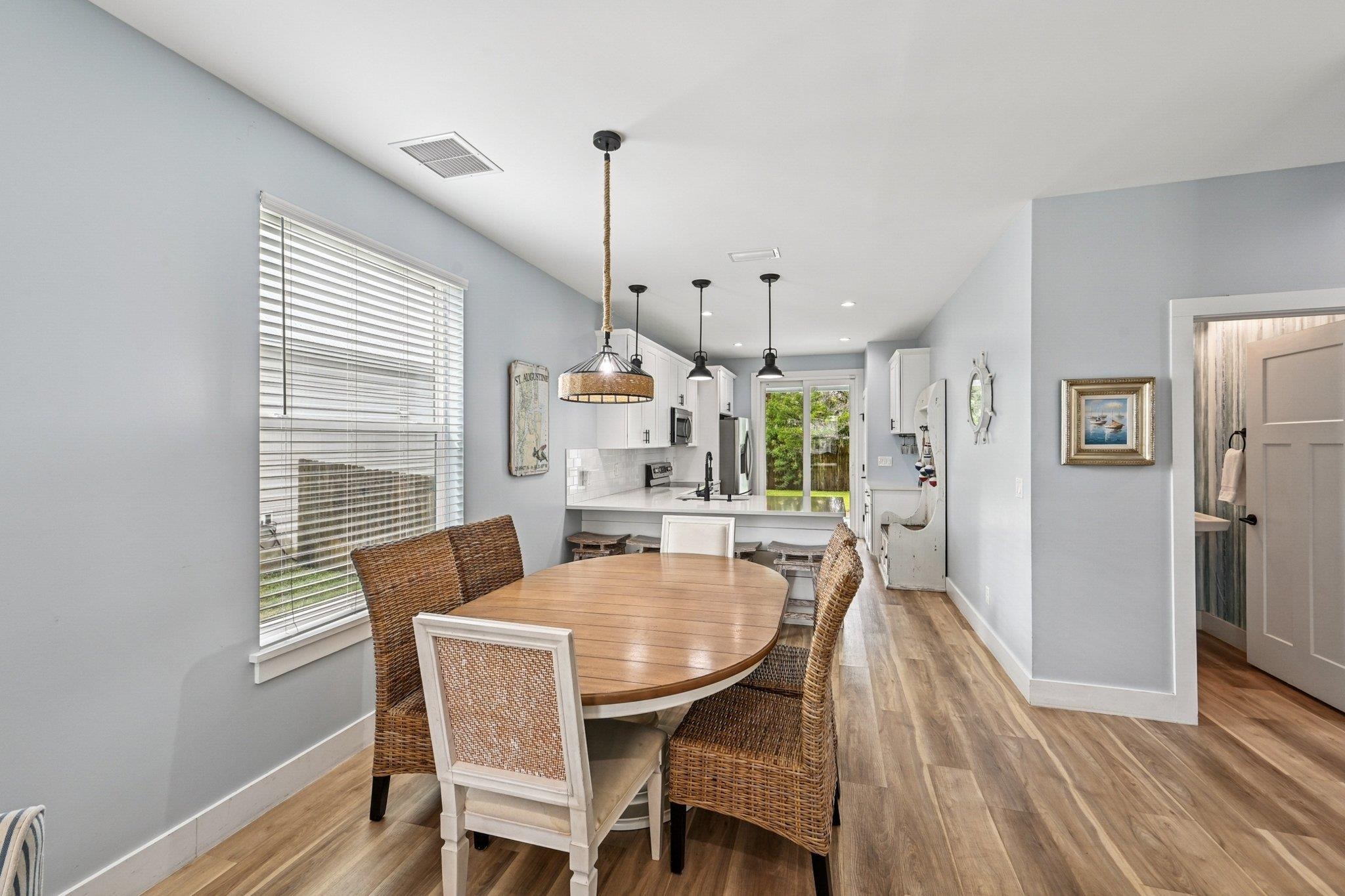 43 Menendez Road St. Augustine, FL 32080 - Photo 12 of 48 Dining room featuring light wood-type flooring and recessed lighting