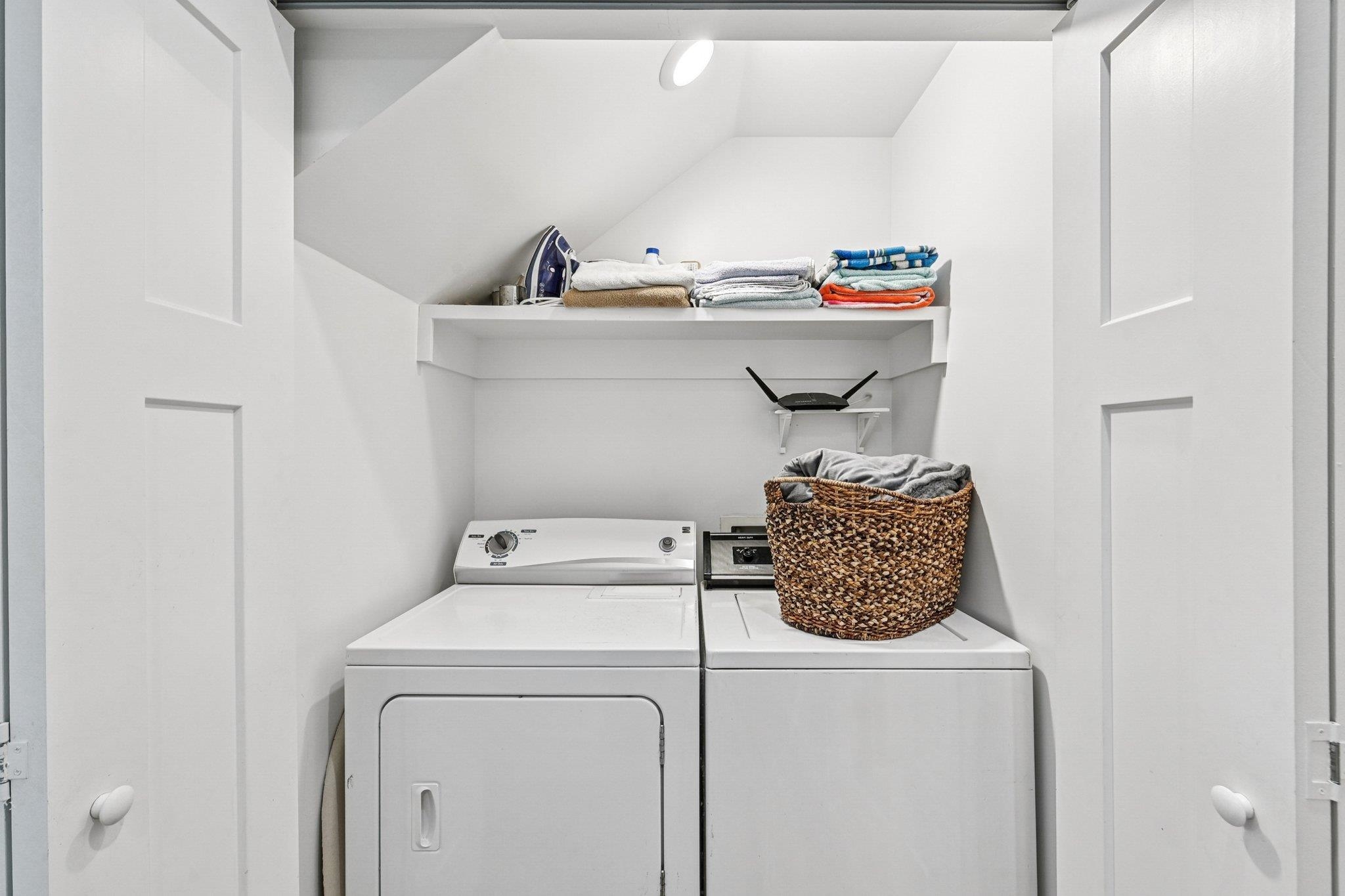 43 Menendez Road St. Augustine, FL 32080 - Photo 21 of 48 Laundry room featuring washing machine and dryer