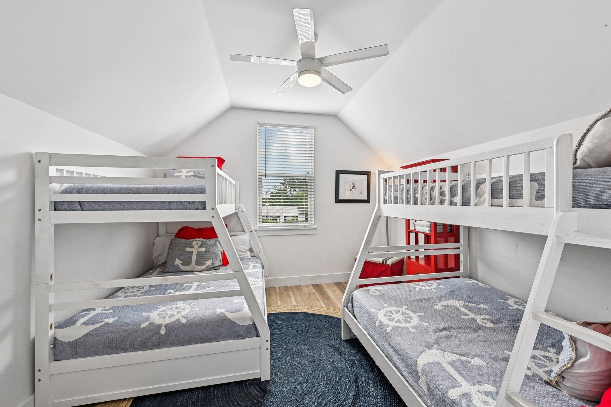 43 Menendez Road St. Augustine, FL 32080 - Photo 23 of 48 Bedroom with lofted ceiling, a ceiling fan, and light wood finished floors