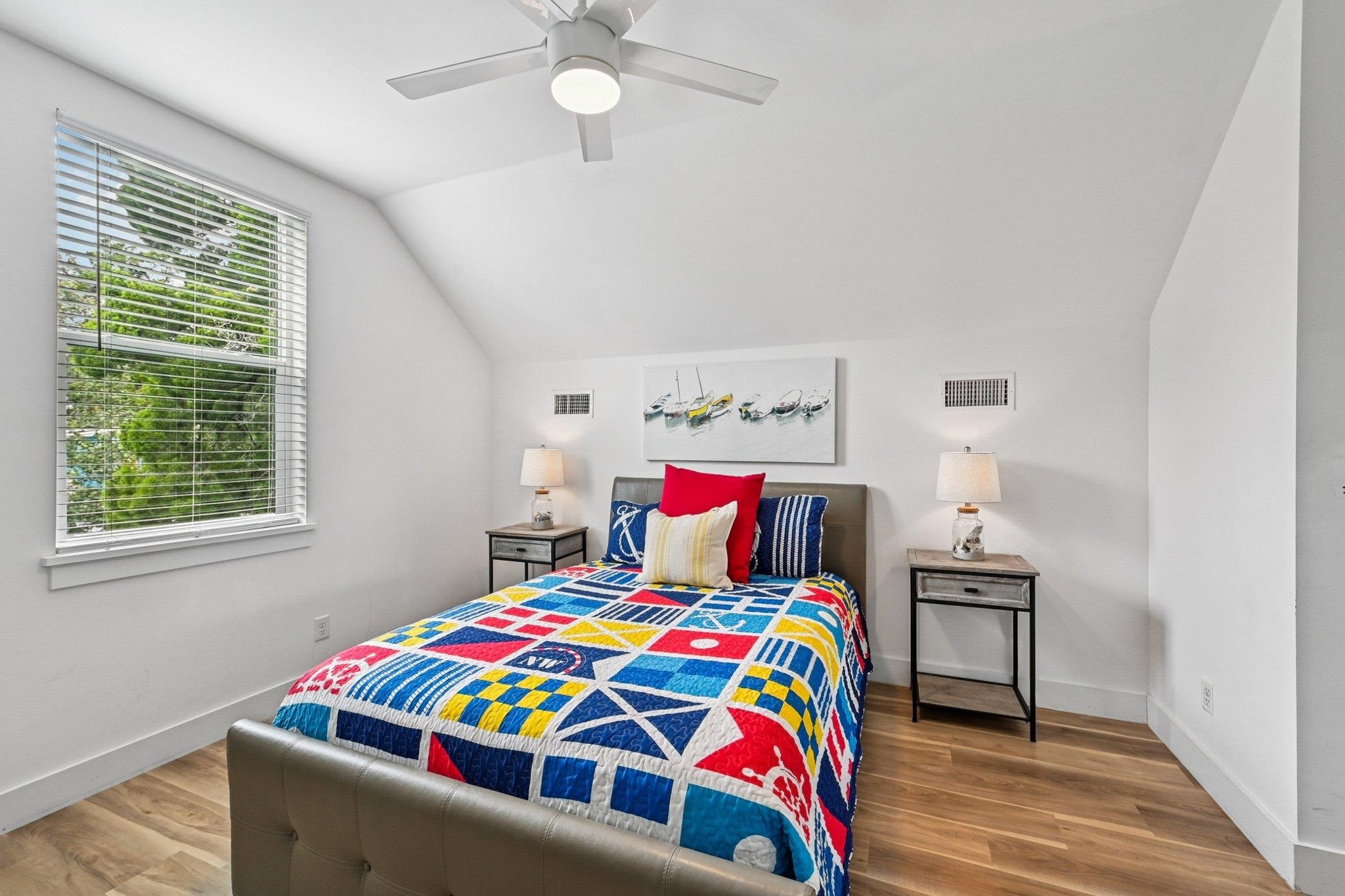 43 Menendez Road St. Augustine, FL 32080 - Photo 31 of 48 Bedroom with lofted ceiling, wood finished floors, and a ceiling fan