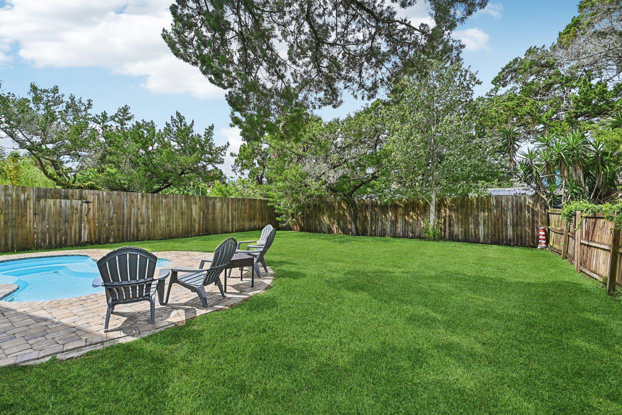 43 Menendez Road St. Augustine, FL 32080 - Photo 40 of 48 Fenced backyard with a patio