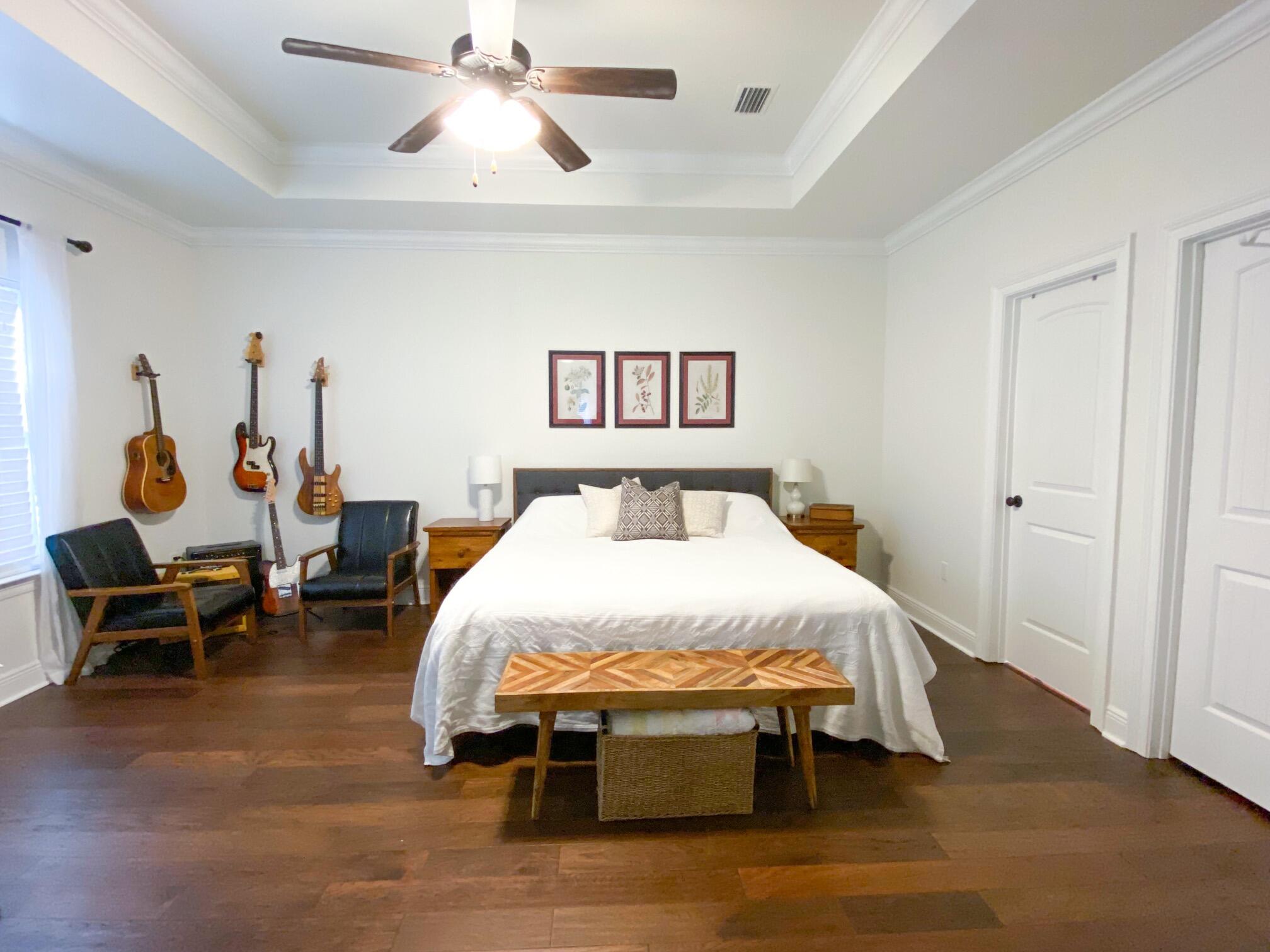 285 Maddox Street Santa Rosa Beach, FL 32459 - Photo 25 of 35 a bed room with a bed and a chair