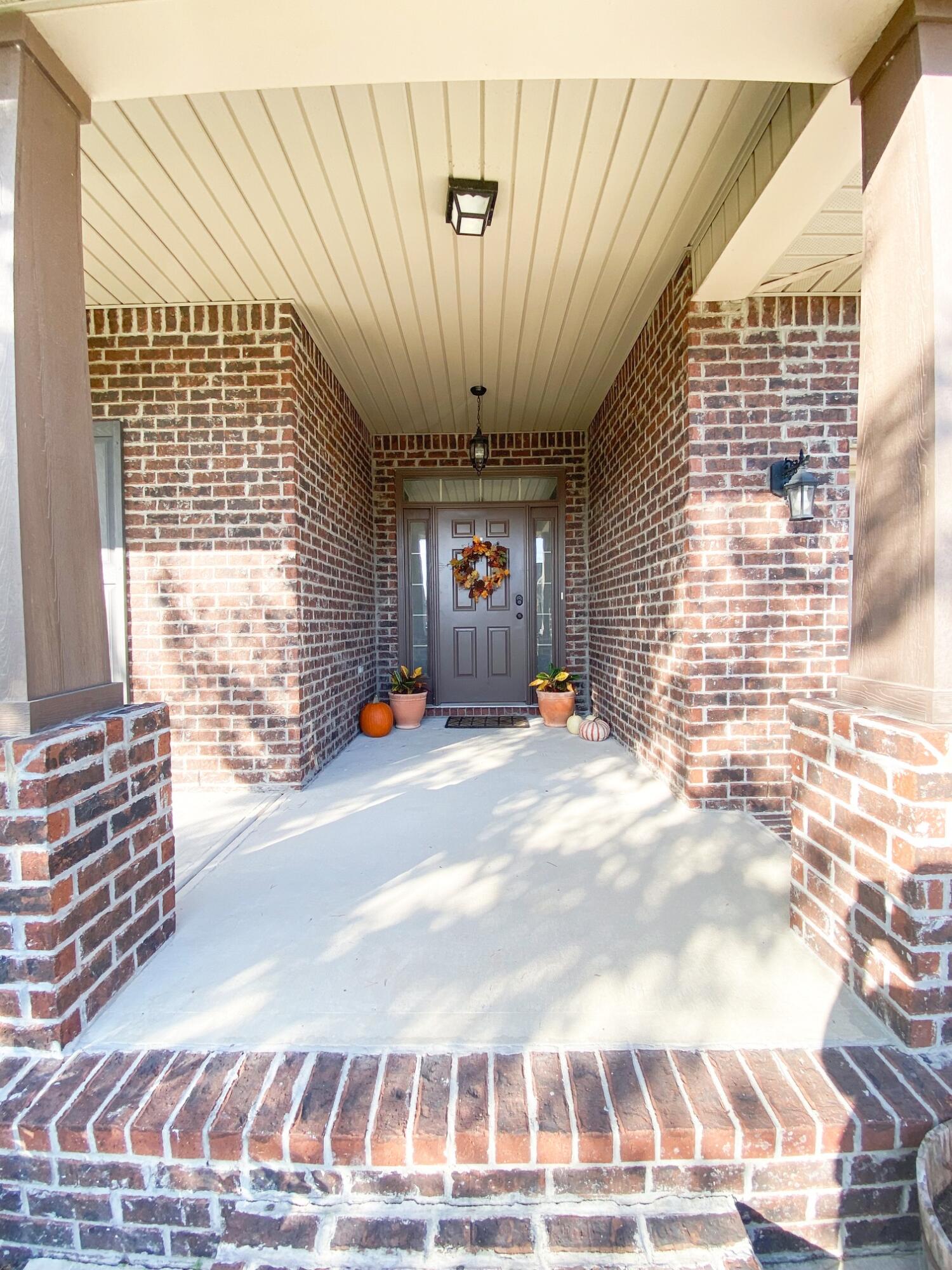 285 Maddox Street Santa Rosa Beach, FL 32459 - Photo 6 of 35 a view of spacious bedroom and front door
