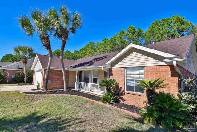 a house view with a garden space