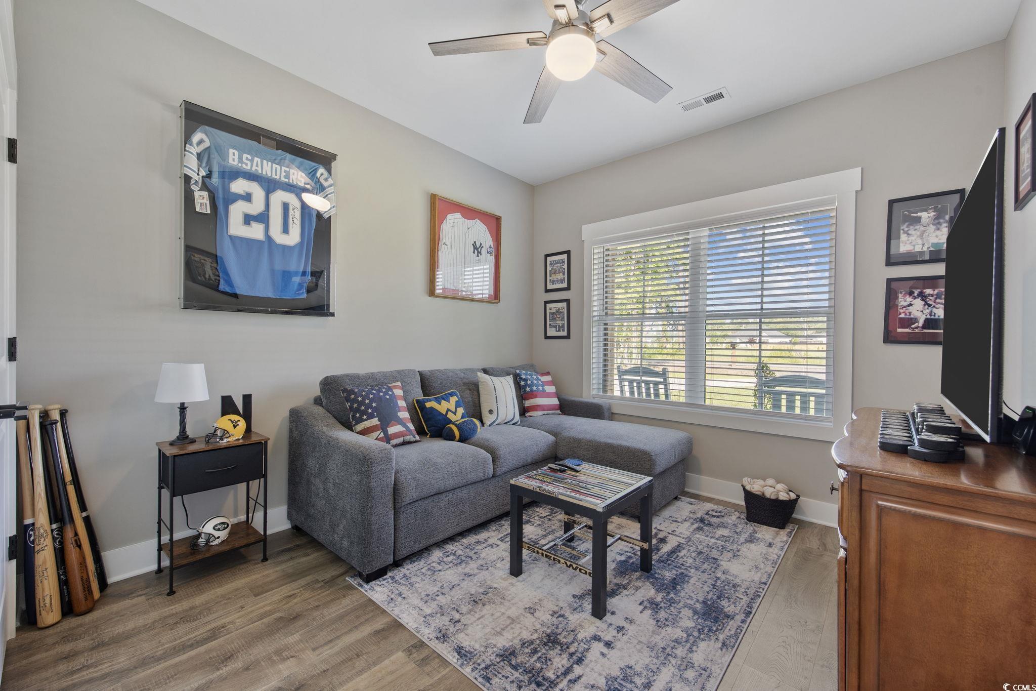 4446 Boggy Road Conway, SC 29526 - Photo 17 of 25 Living area with a ceiling fan and wood finished floors