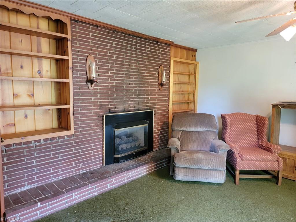 744 Stokesburg Road Walnut Cove, NC 27052 - Photo 8 of 41 Living Room with built in shelving