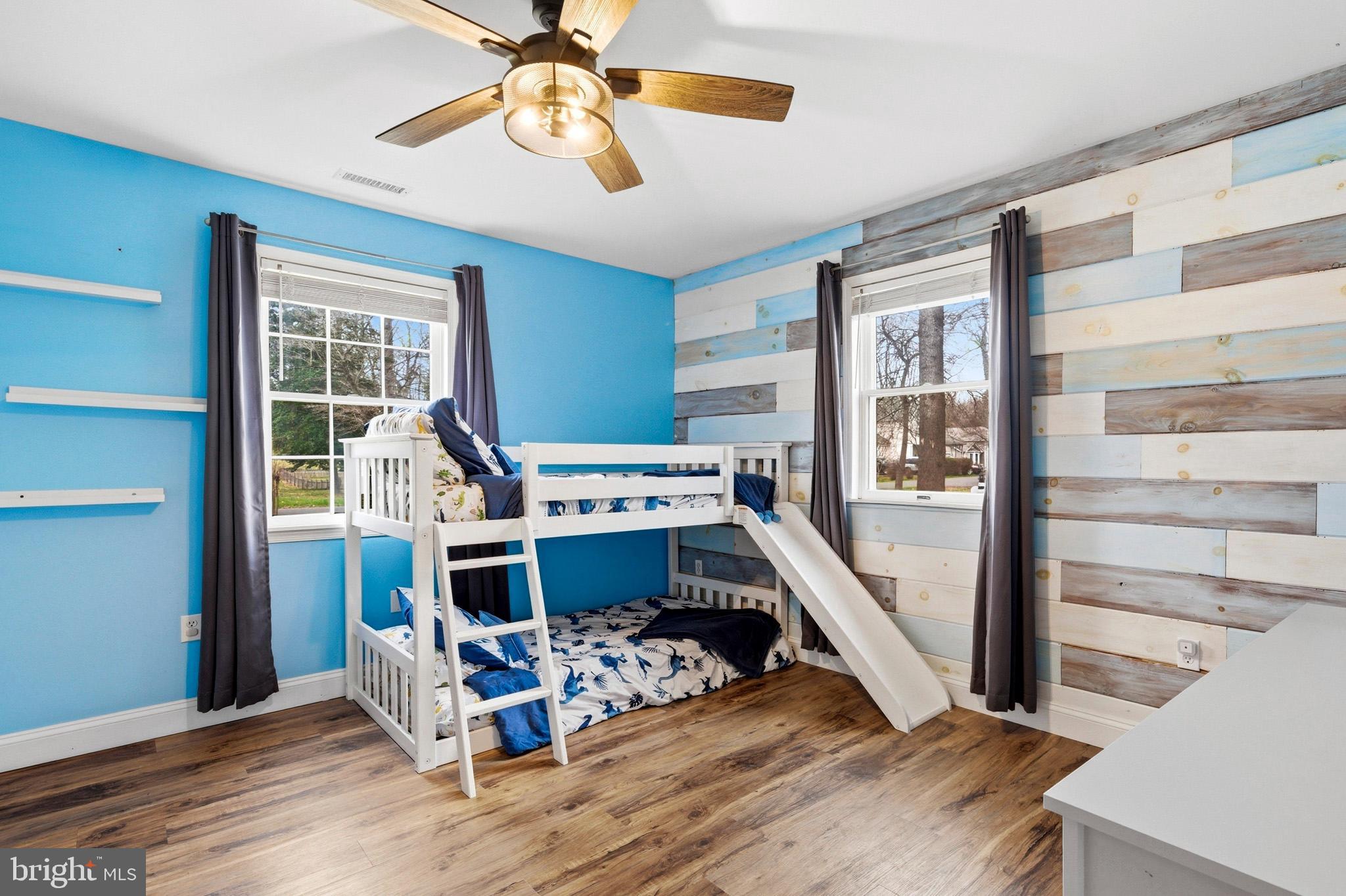 3930 Dogwood Road Port Republic, MD 20676 - Photo 27 of 48 a living room with furniture and a wooden floor