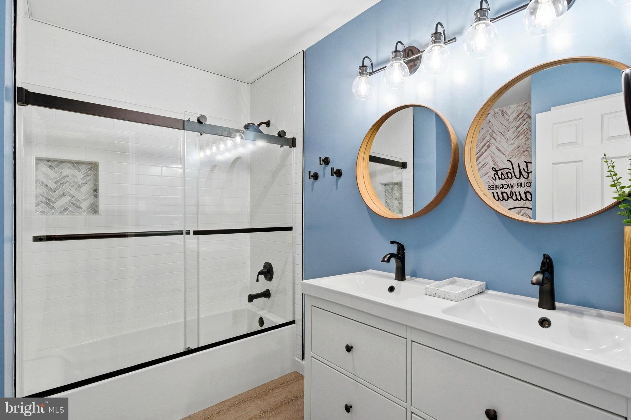 3930 Dogwood Road Port Republic, MD 20676 - Photo 29 of 48 a bathroom with a sink and a mirror