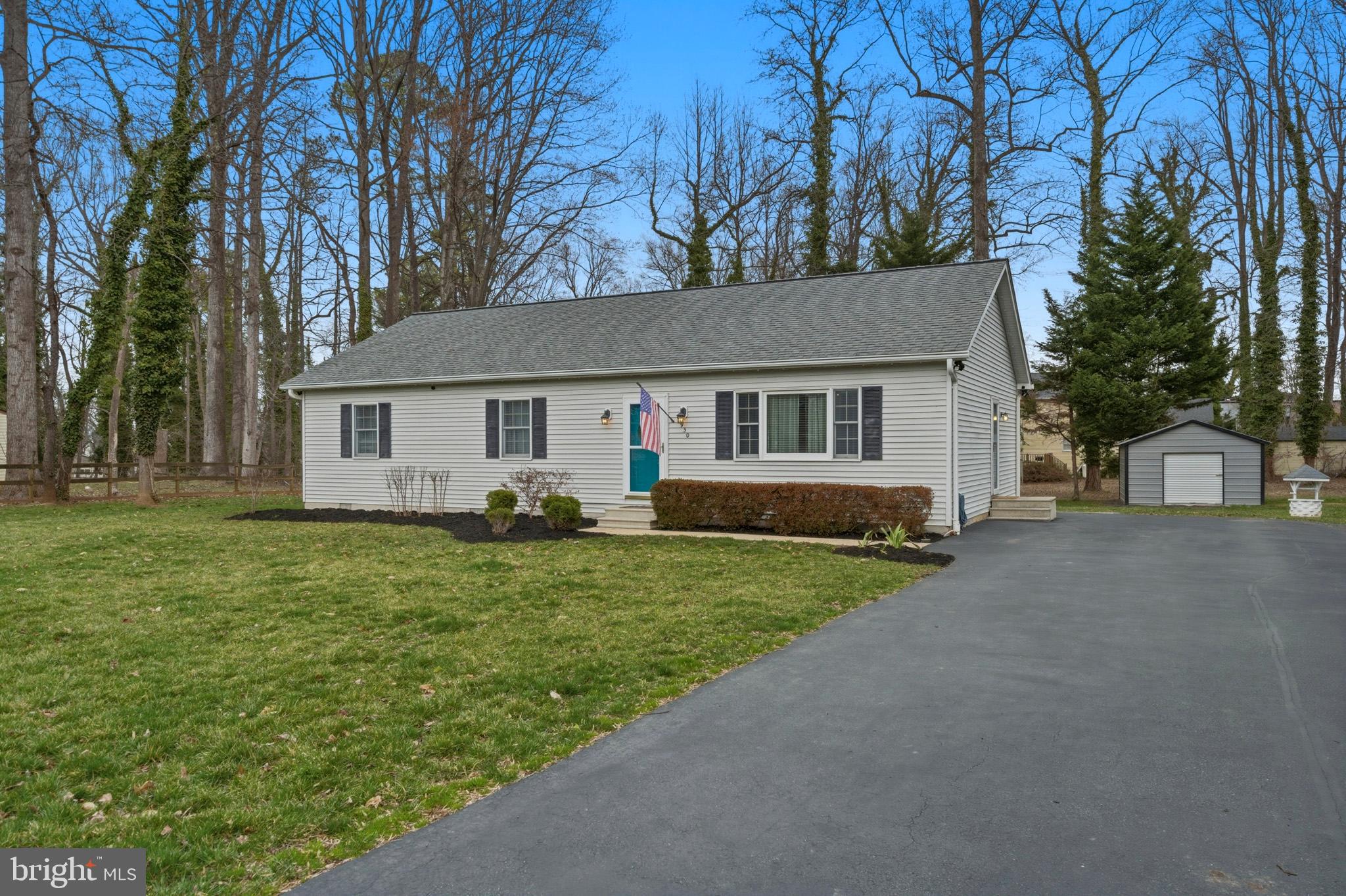 3930 Dogwood Road Port Republic, MD 20676 - Photo 46 of 48 a view of a house with a yard
