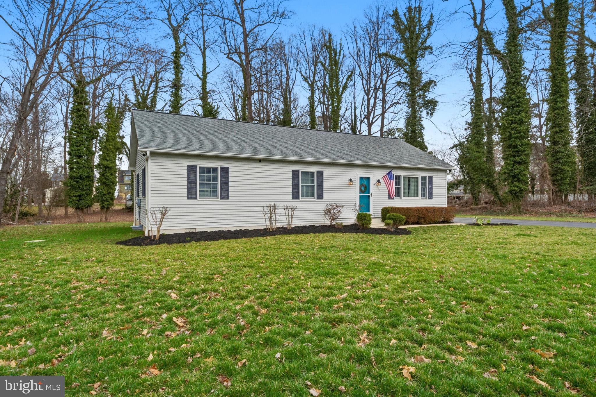 3930 Dogwood Road Port Republic, MD 20676 - Photo 47 of 48 a front view of house with yard and green space