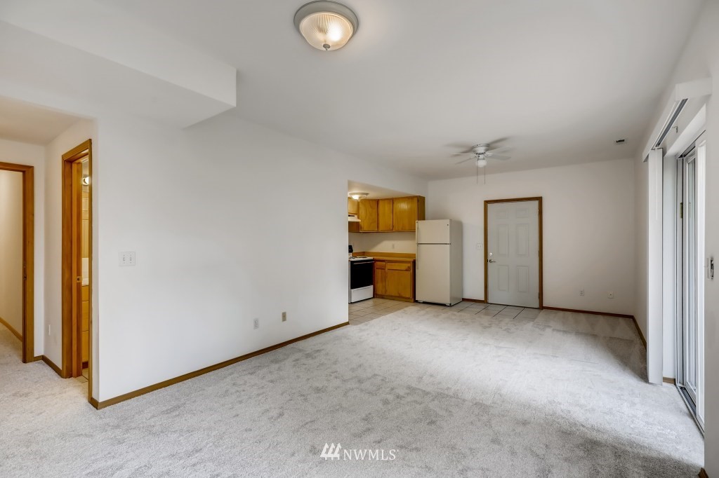 16648 Sylvester Road Southwest Burien, WA 98166 - Photo 26 of 36 an empty room with closet and windows