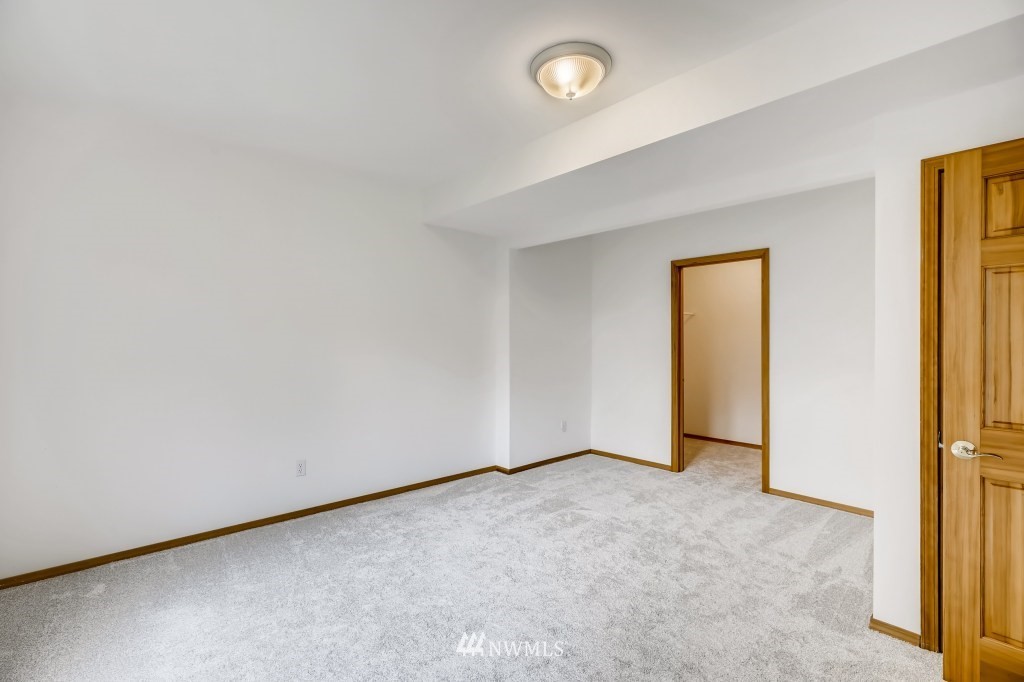 16648 Sylvester Road Southwest Burien, WA 98166 - Photo 28 of 36 an empty room with windows