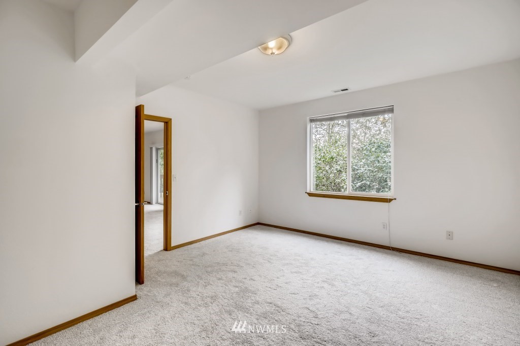 16648 Sylvester Road Southwest Burien, WA 98166 - Photo 29 of 36 an empty room with windows