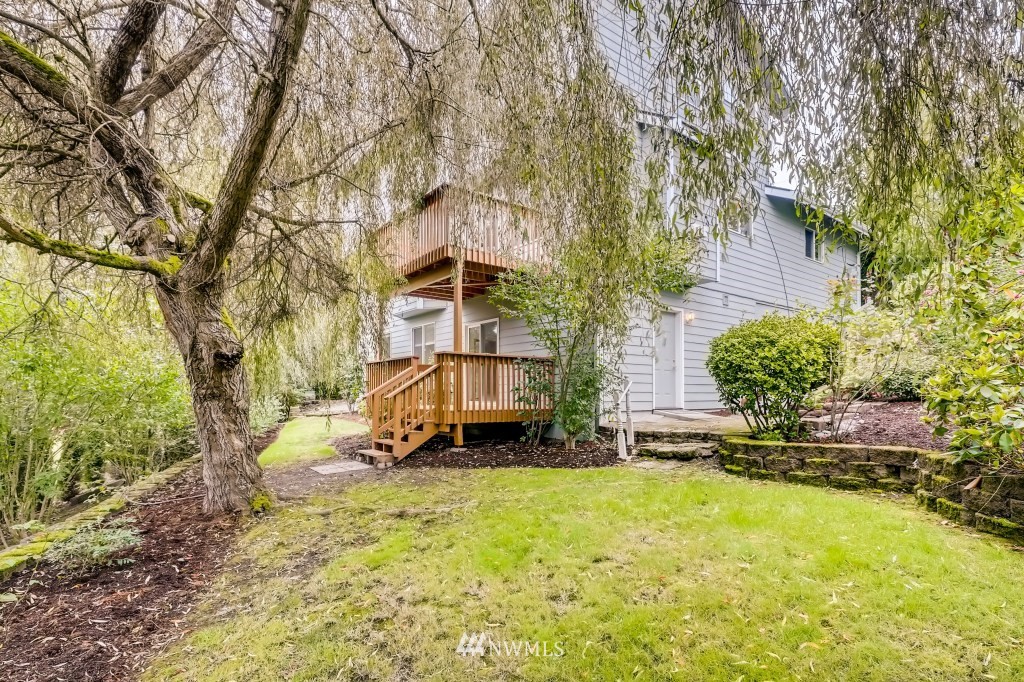 16648 Sylvester Road Southwest Burien, WA 98166 - Photo 32 of 36 a view of a house with a yard