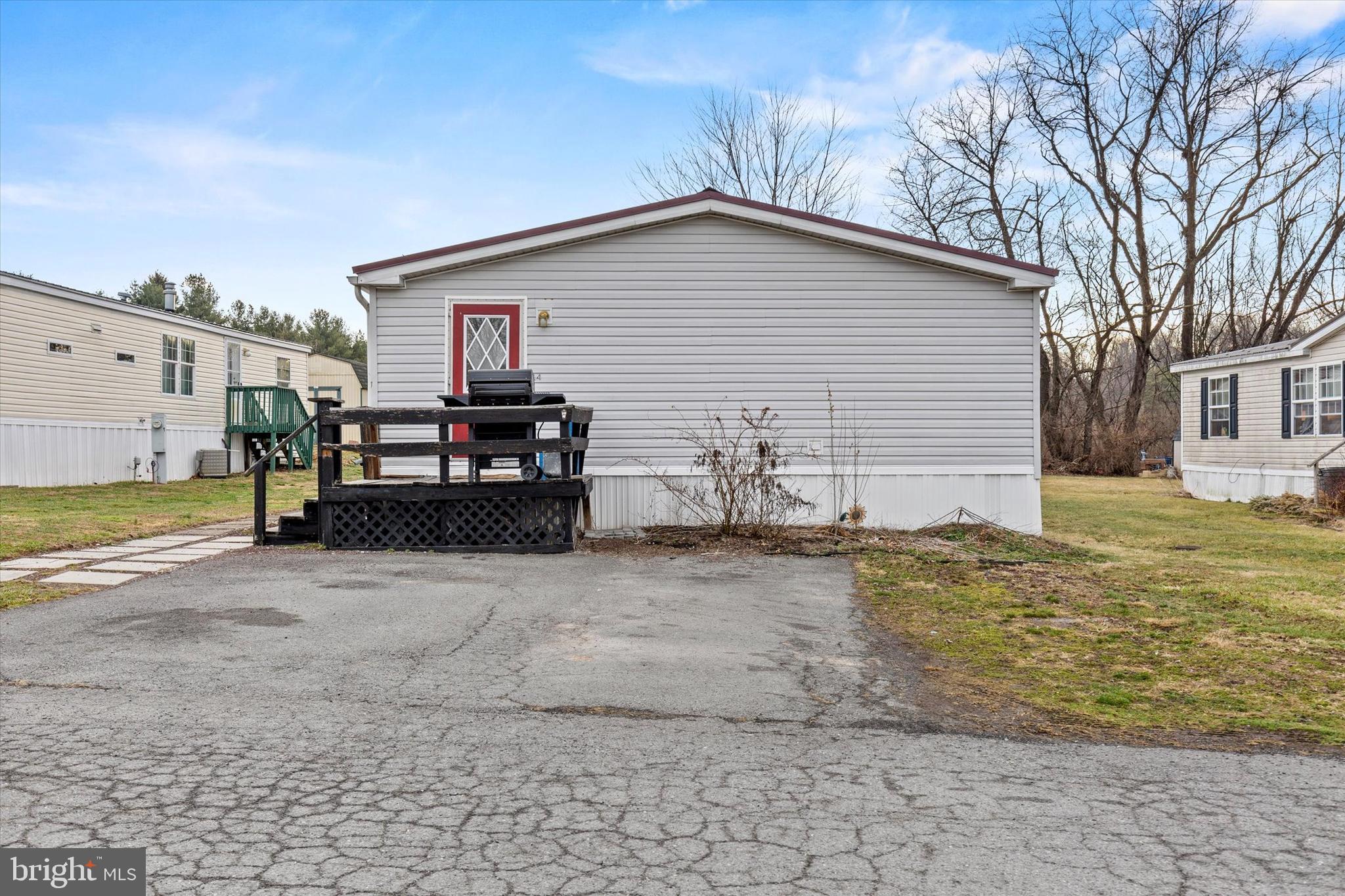 14 Junction Road Millersburg, PA 17061 - Photo 22 of 23 a view of a house with backyard and a tree