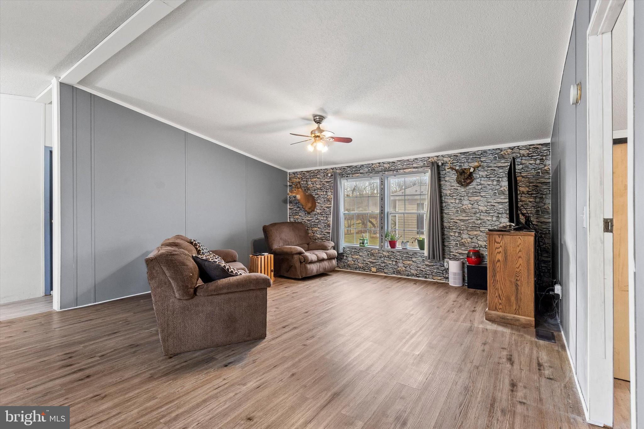 14 Junction Road Millersburg, PA 17061 - Photo 6 of 23 a living room with furniture and a large window