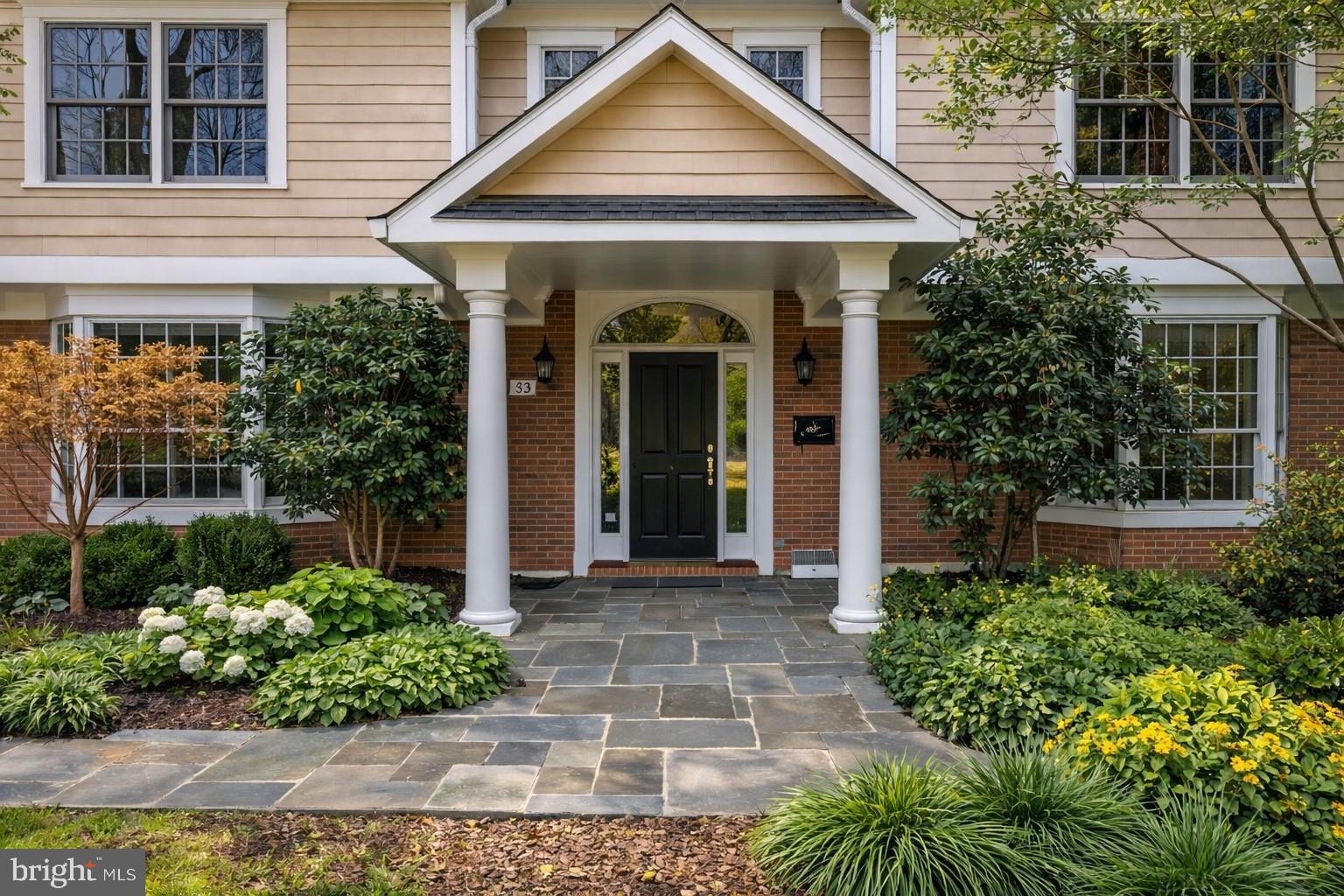 7838 Aberdeen Road Bethesda, MD 20814 - Photo 2 of 29 Inviting entrance with lush greenery.