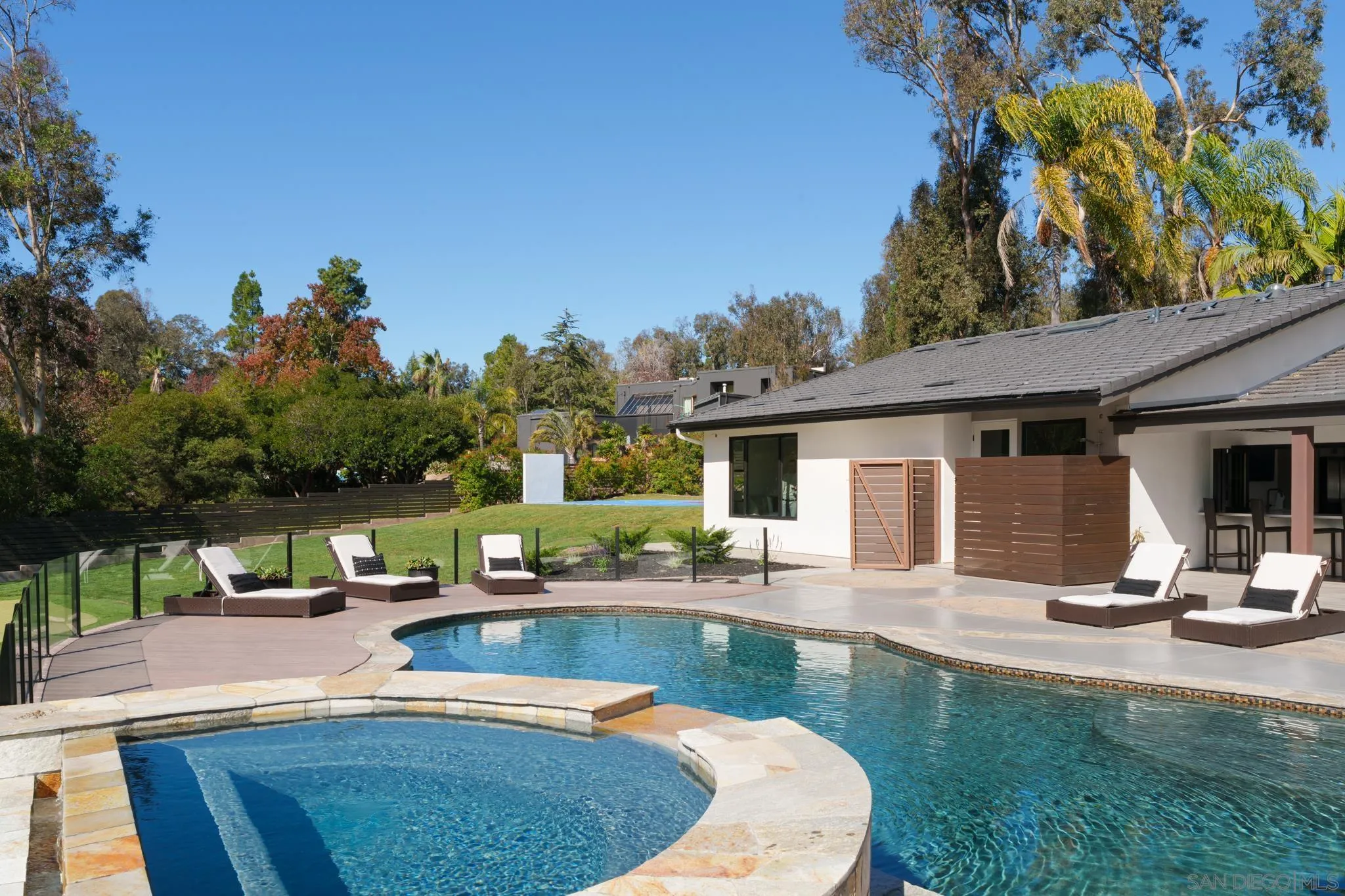 15102 Sun Valley Lane Del Mar, CA 92014 - Photo 16 of 45 a view of a house with swimming pool and sitting area