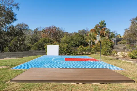 a view of swimming pool with a yard