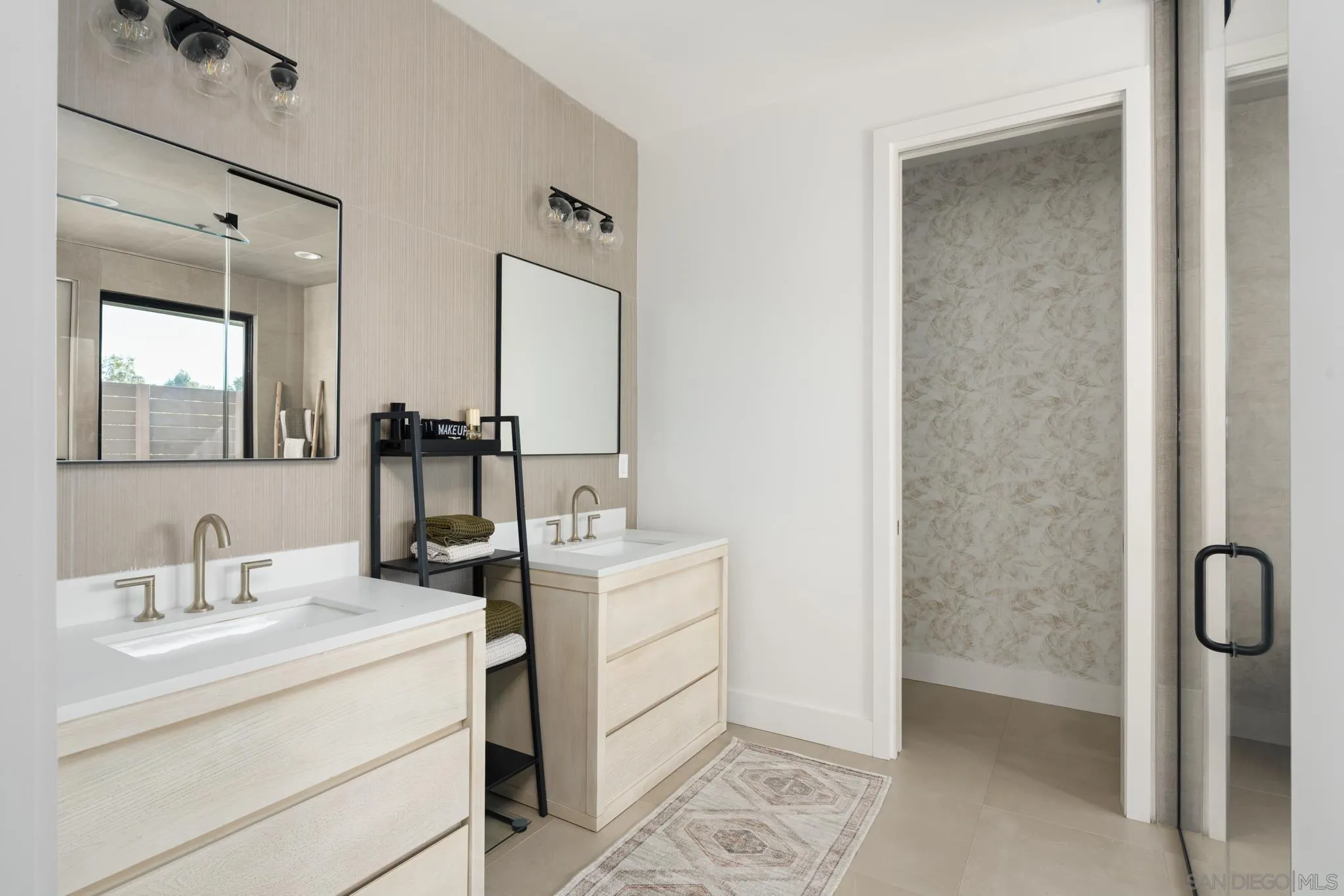 15102 Sun Valley Lane Del Mar, CA 92014 - Photo 37 of 45 a bathroom with a sink a toilet and mirror