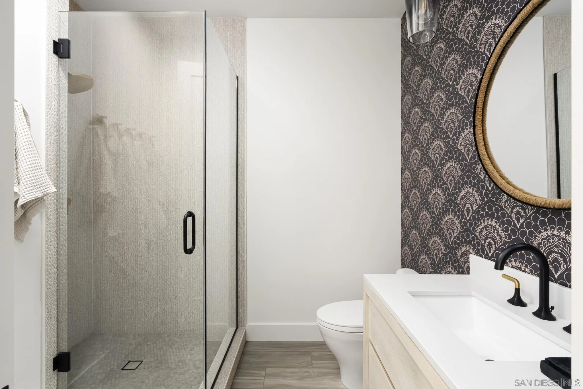 15102 Sun Valley Lane Del Mar, CA 92014 - Photo 40 of 45 a bathroom with a sink toilet and shower